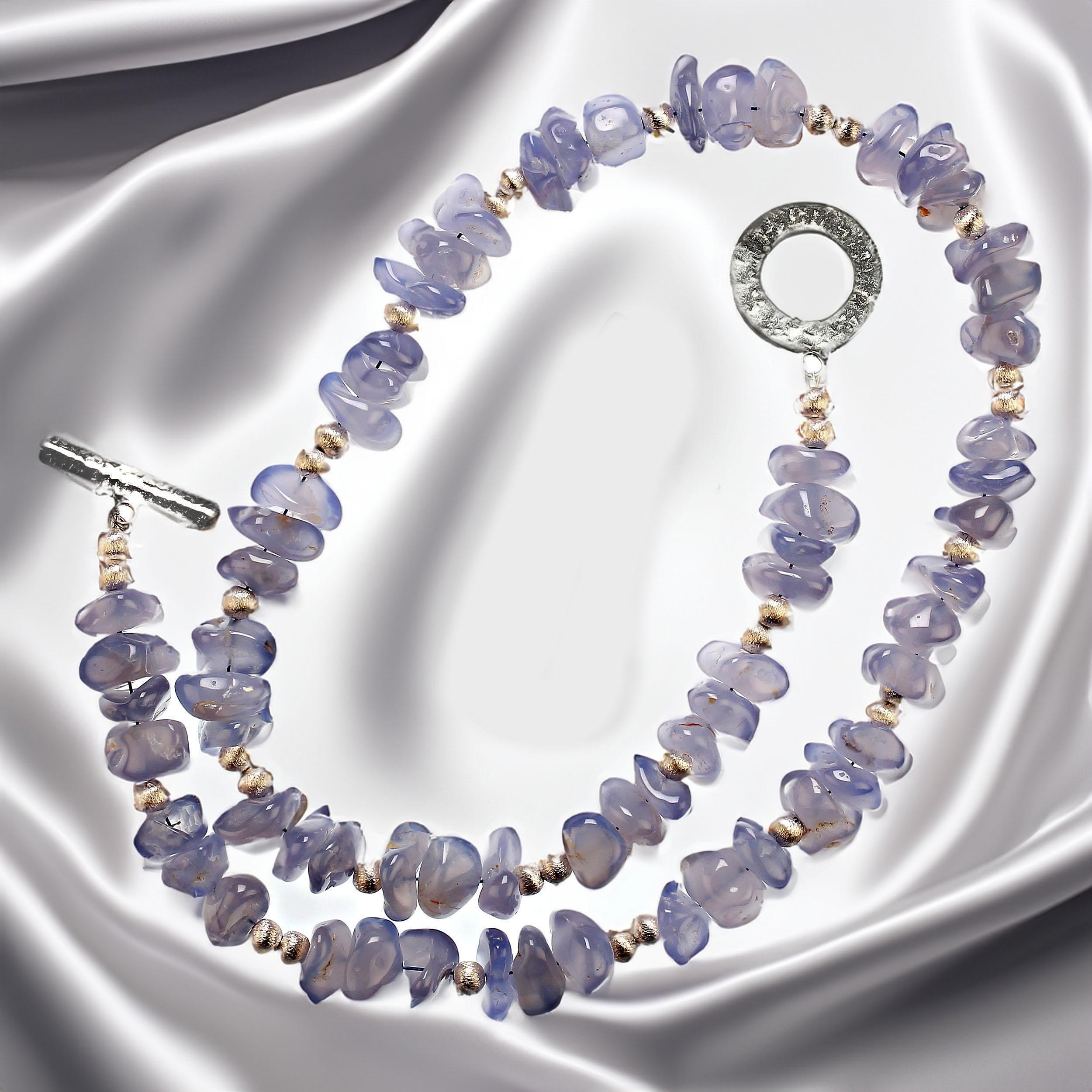 Fabulous 24-inch blue chalcedony highly polished nugget, 10x10mm, necklace with brushed silver tone accents.   This unique necklace features a hammered sterling silver toggle clasp.  MN2358