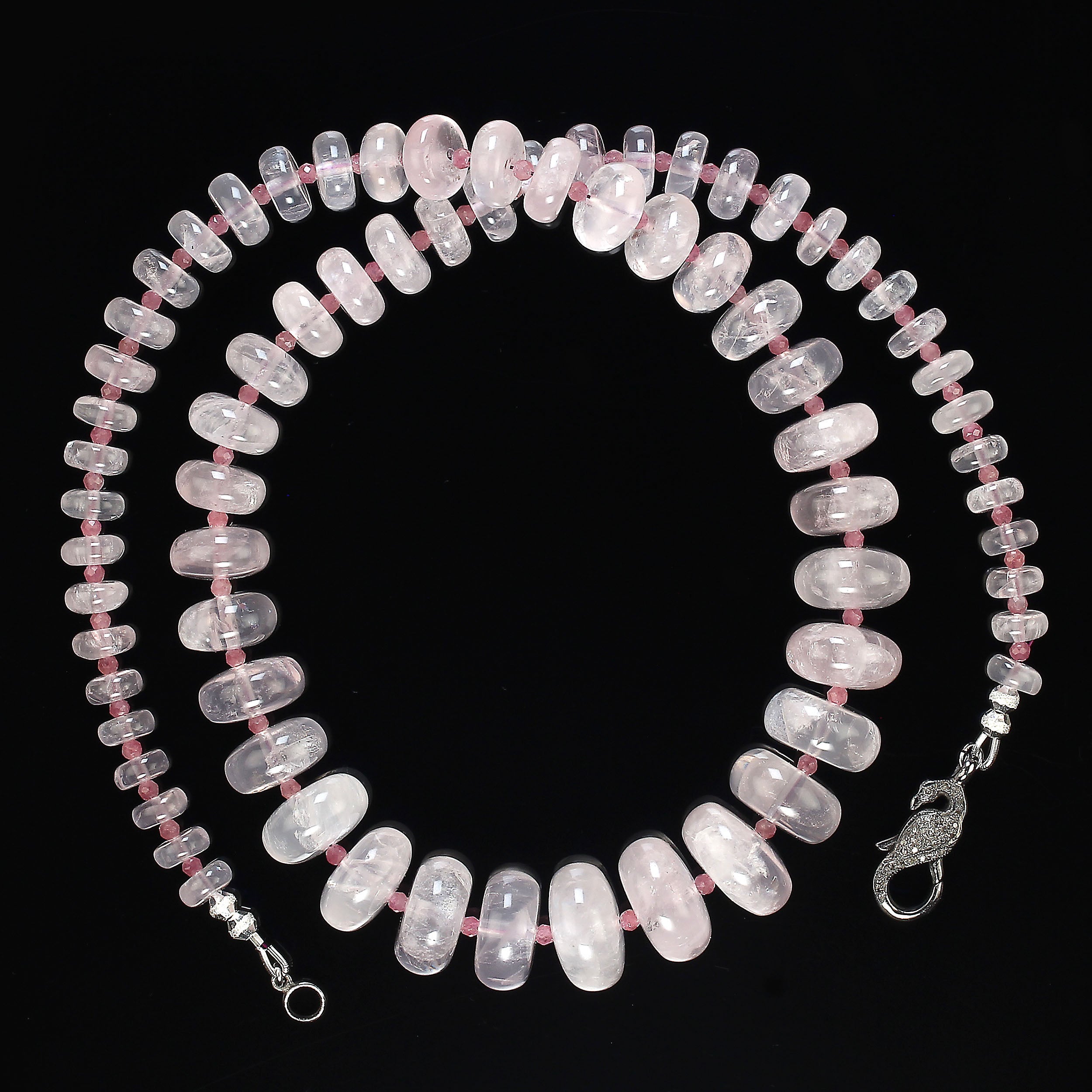 
Elegant 24-Inch Rose Quartz and Pink Tourmaline Necklace with Sterling Silver Clasp

Enhance your jewelry collection with this gorgeous 24-inch necklace, featuring smooth, transparent rondelles of natural rose quartz. The rose quartz gemstones