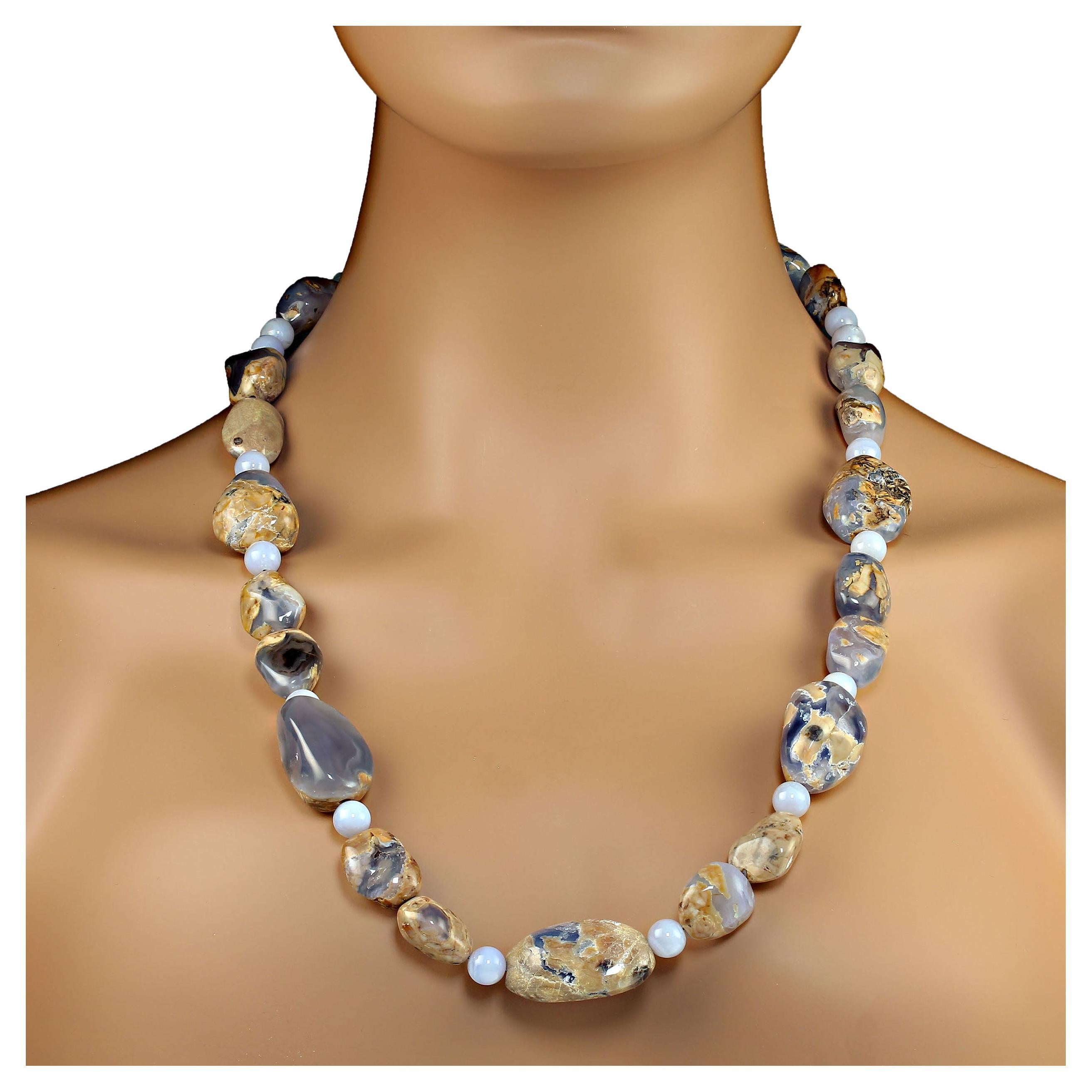 Unique 26-Inch Blue Chalcedony Necklace – A Stunning Statement Piece
Discover the beauty of our 26-inch unique necklace, featuring a captivating combination of highly polished blue chalcedony nuggets and 8mm round blue chalcedony beads. This