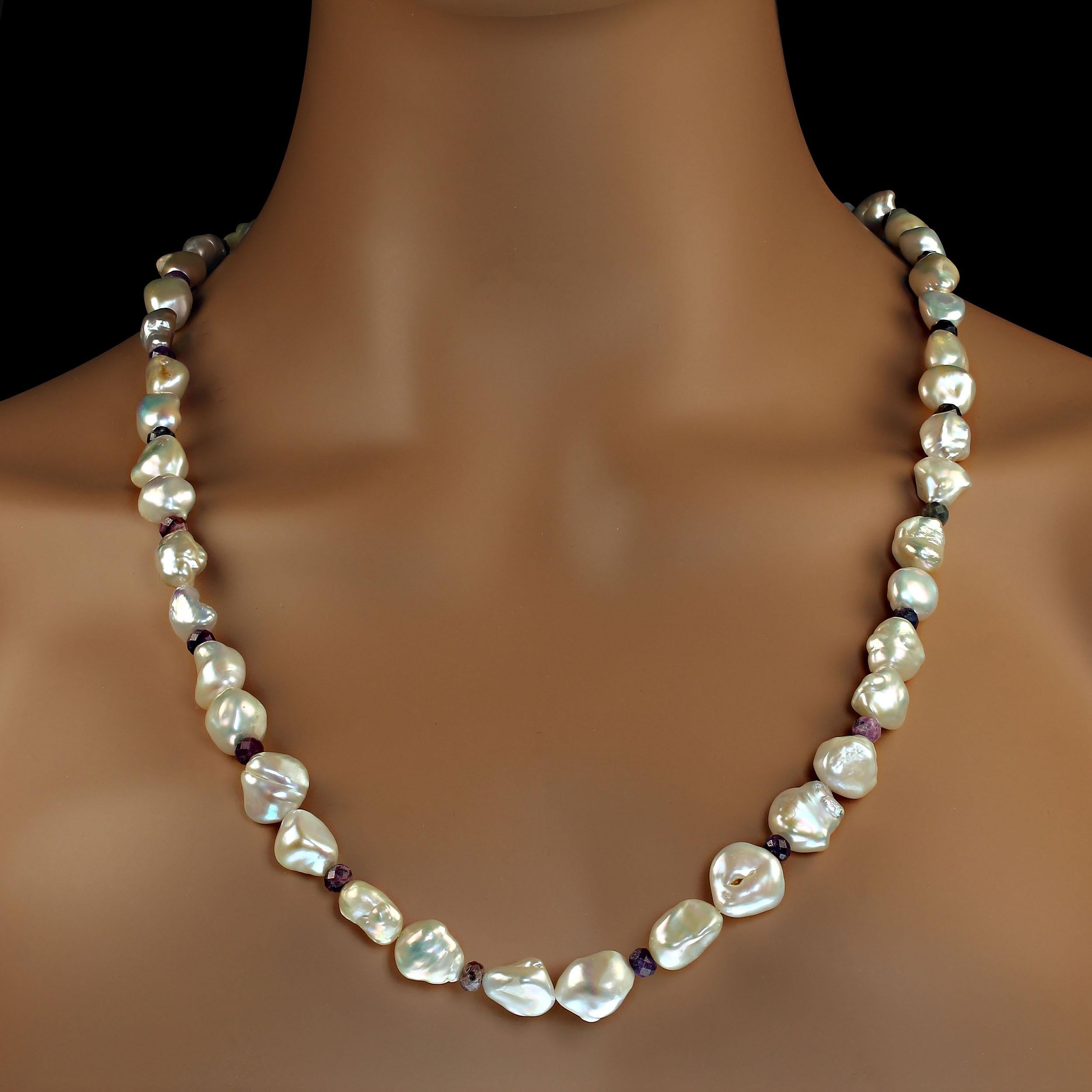 Glowing white freshwater pearl necklace with matte multi color sapphire accents. The white freshwater pearls are from the 2nd harvest. They have a special glow and luster.  They juxtapose the matte finish of the 6mm multi color sapphire rondelles. 