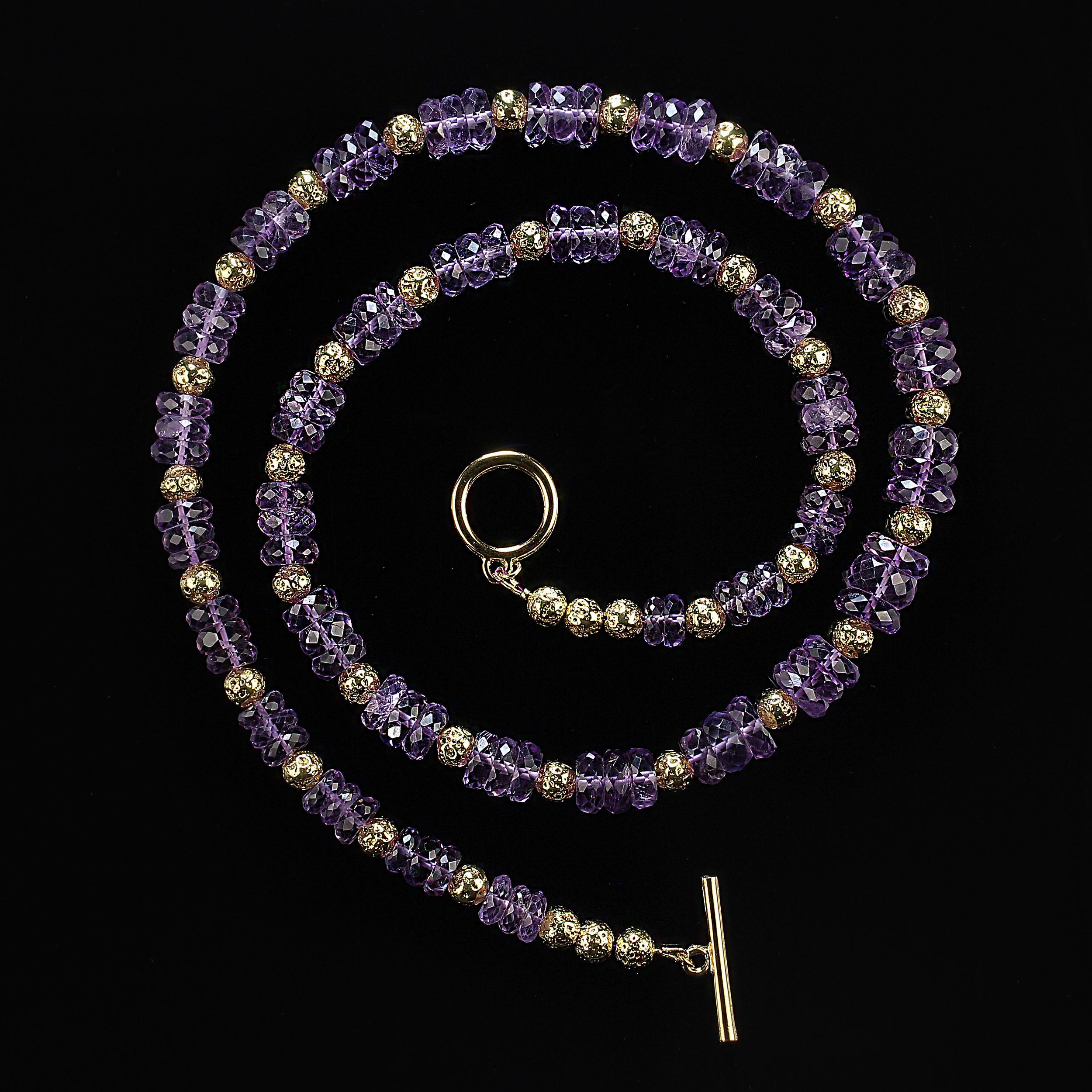 27-inch sparkling lilac amethyst necklace with goldy lava accents and toggle clasp.  This necklace sparkles and pops as the faceted amethyst rondelles catch the light as well as the brilliant lava rock accents between the amethyst.  The amethyst is