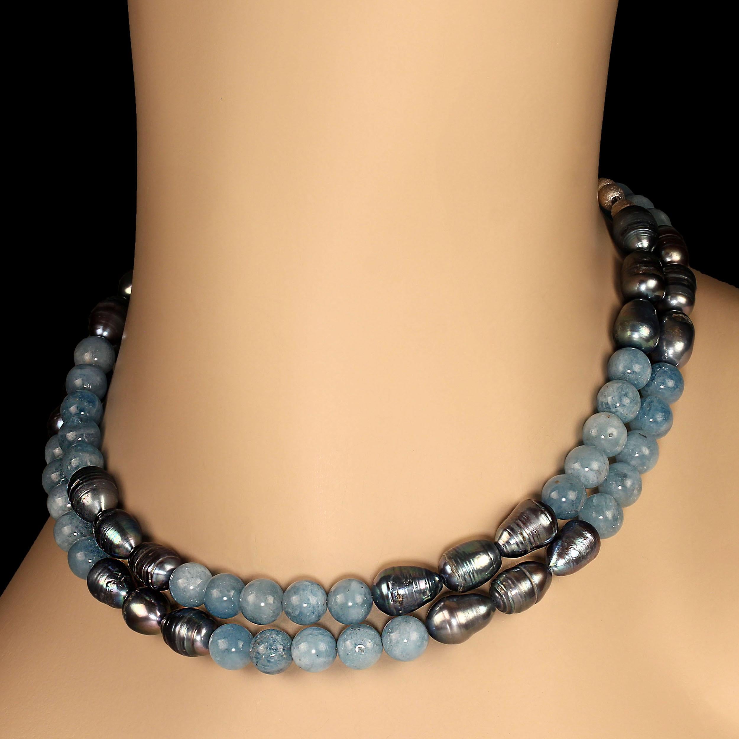 31-Inch sophisticated evening necklace of steel gray potato pearls,12x8mm and medium tone blue 8mm aquamarines. These alternating groups of pearls and aquamarines create an elegant look perfect for your out to dinner or evening affair. At 31 inches