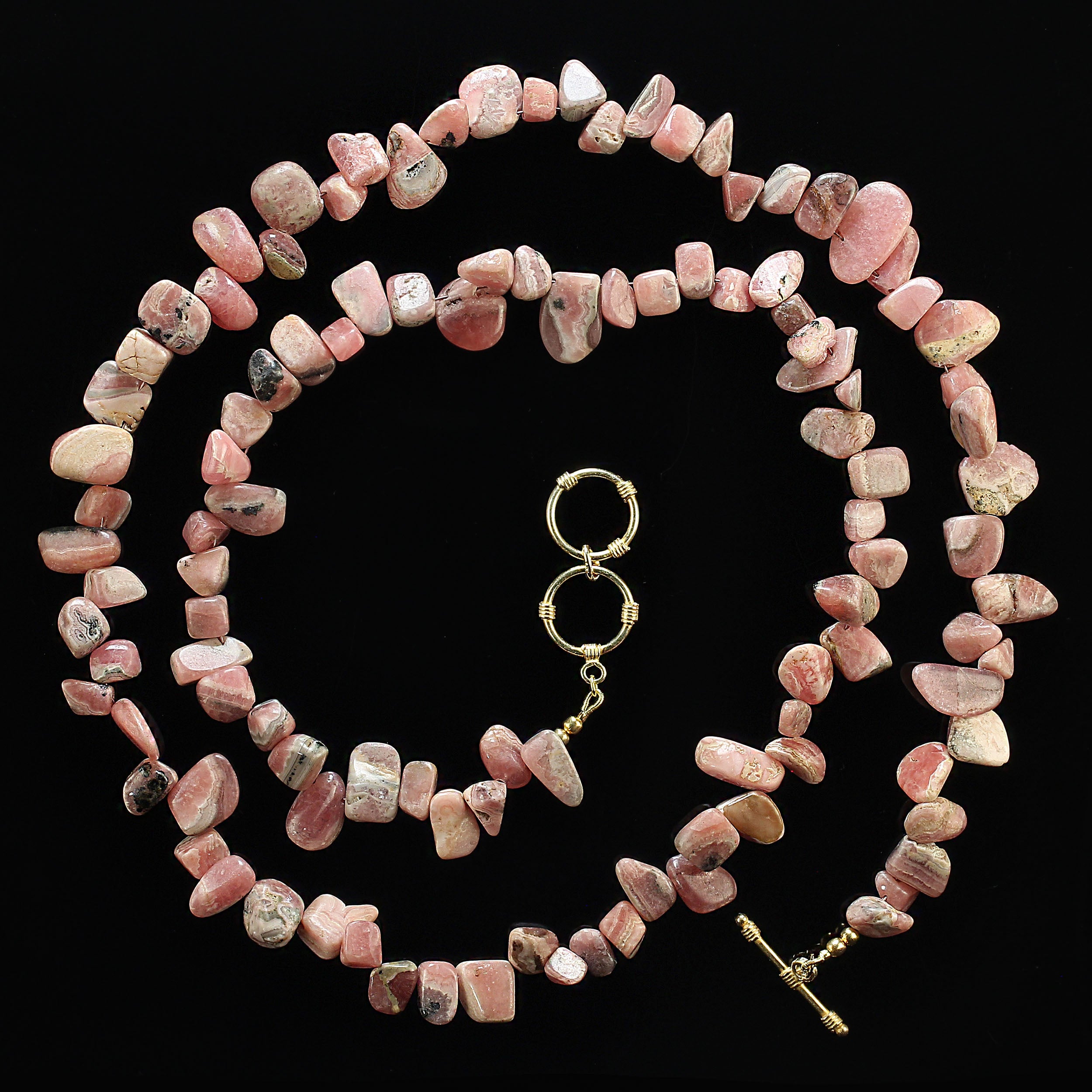 

31-Inch Rhodochrosite Necklace with Polished Nugget Beads – Elegant and Versatile

Discover the beauty of our stunning 31-inch Rhodochrosite necklace featuring highly polished nugget beads. Each bead showcases unique variations in size, ranging