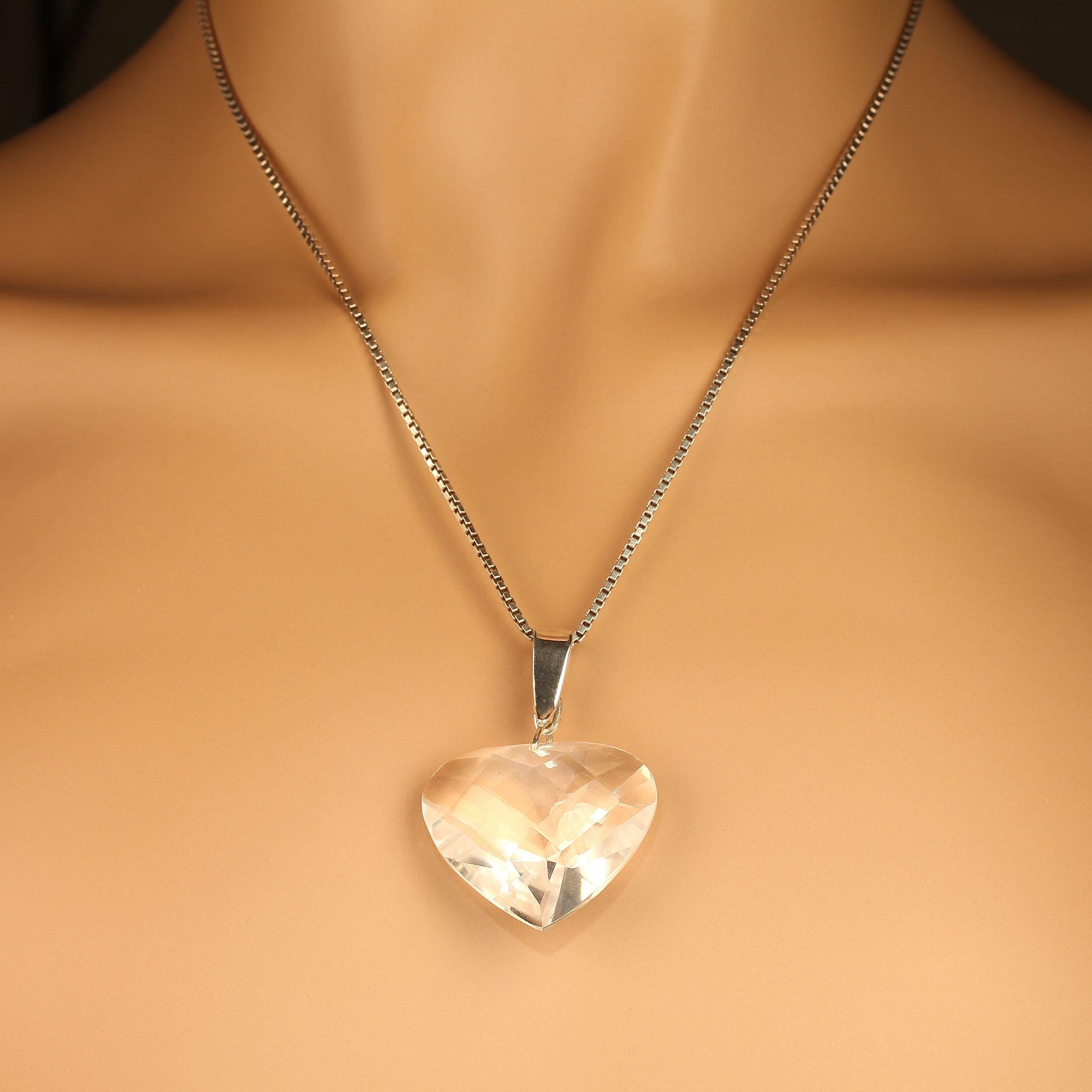 This sparkling fancy cut Quartz Crystal and Sterling Silver heart pendant is just what you need for summer. This gorgeous quartz crystal is supposed to be an amplifying stone which means that whatever you put into it, it will return many times.