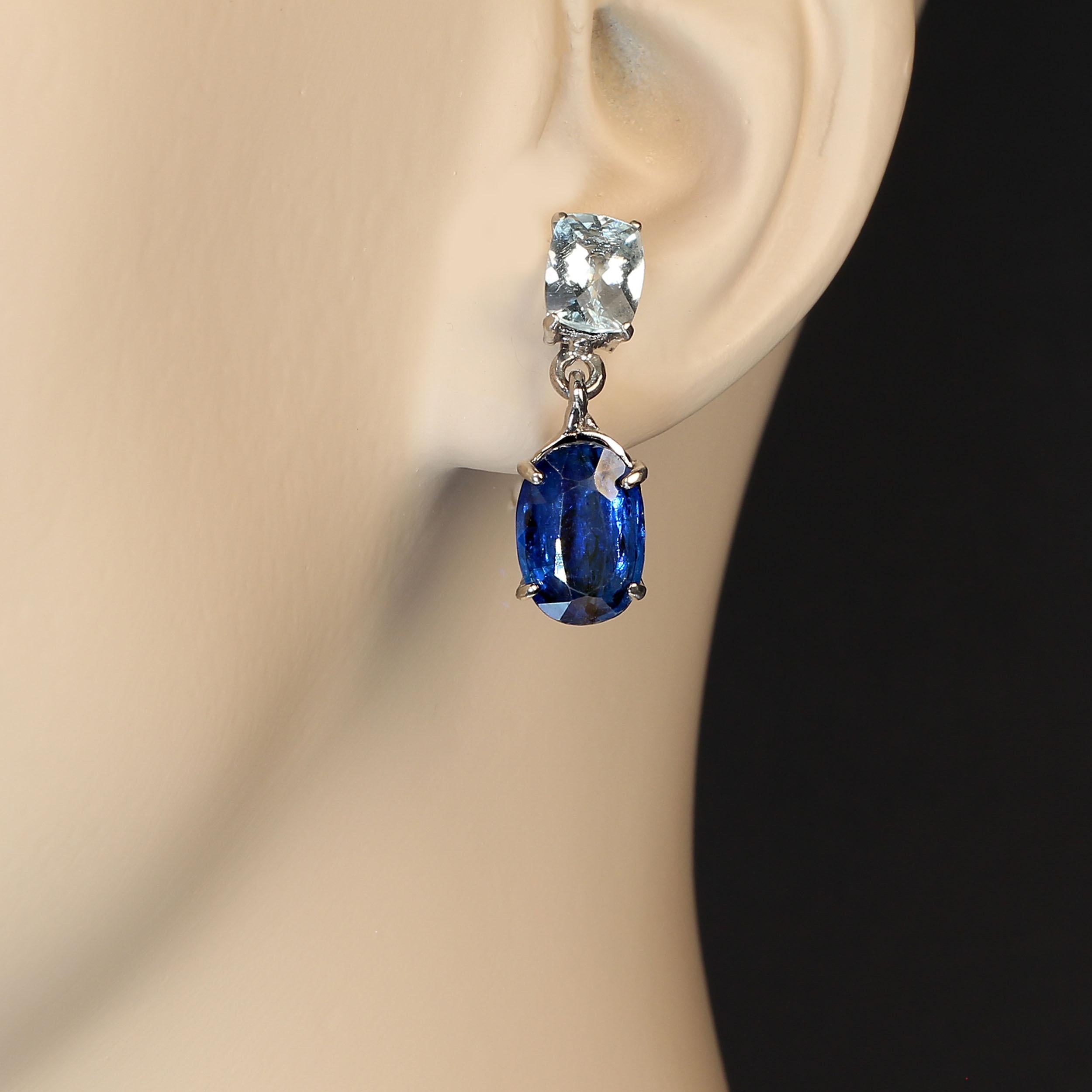 Stunning blue earrings of Aquamarine paired with deeper blue Kyanite.  What's not to love? This gorgeous pair of blue gemstones is set in glowing 14K white gold. The earrings are secured with posts and cushions backs.  They are 15/16 inches in