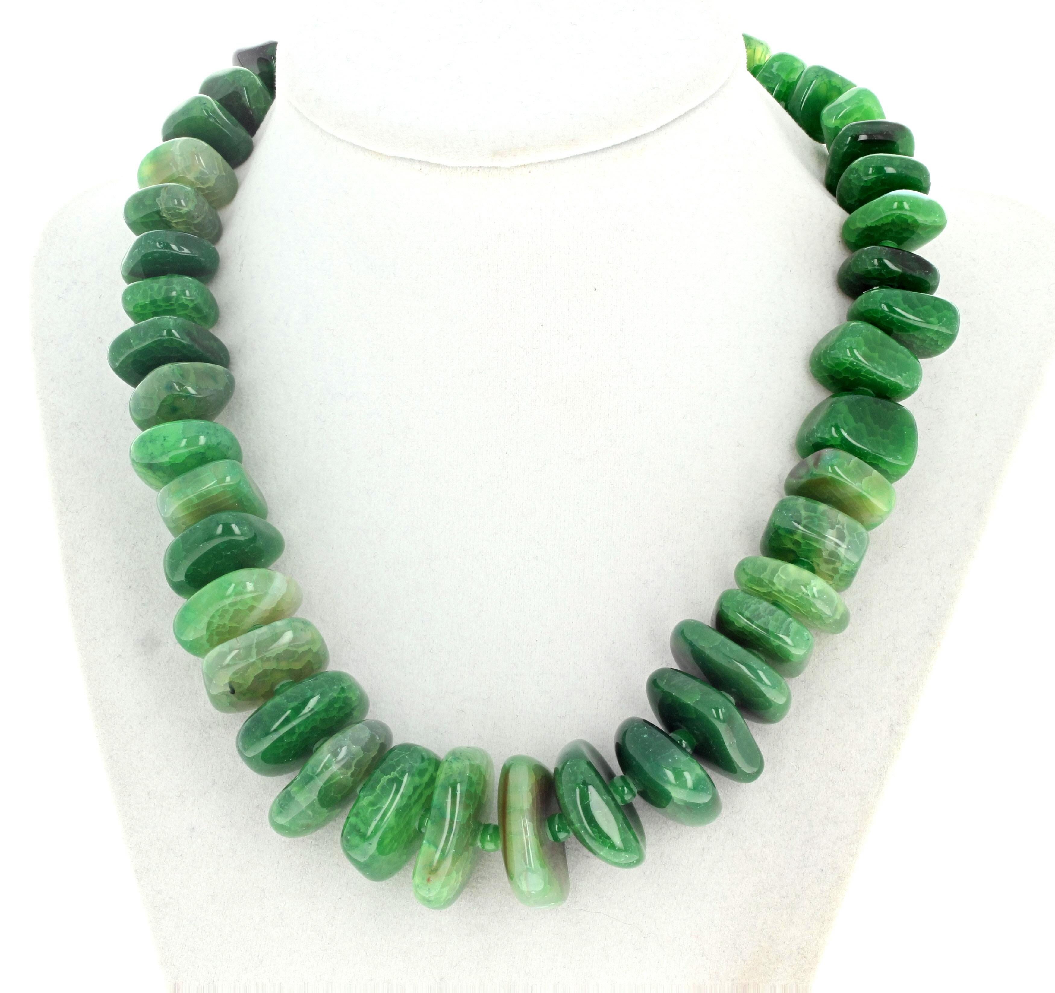 The largest of these magnificent rare green Agates is approximately 26mm x 23mm set in this fascinating 17 1/2 inch long necklace.   The little green spacers are approximately 5mm.  The clasp is a silver easy to use hook clasp.  I admit that this is