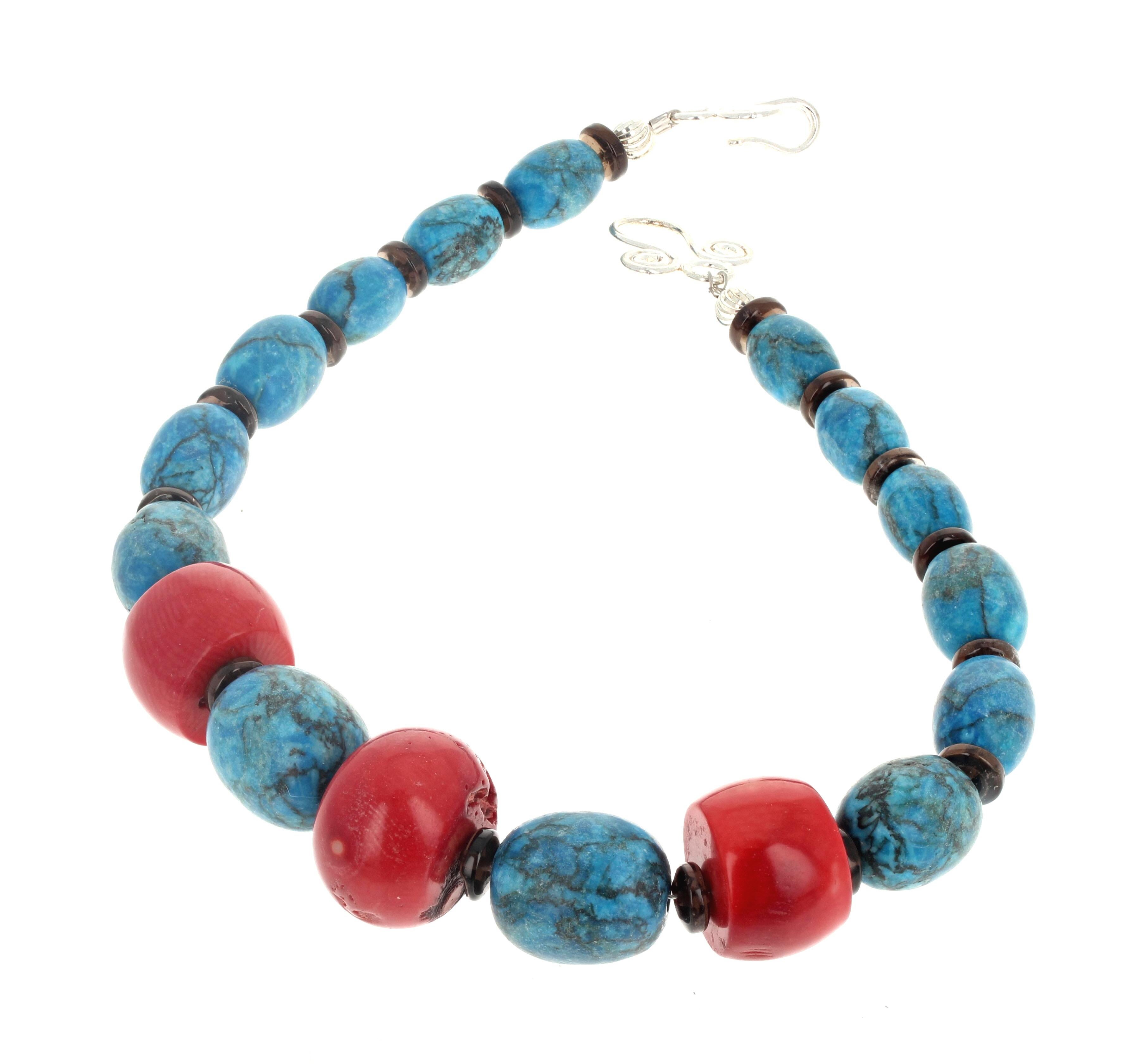 This is exactly 15 inches long with an easy to use silver hook clasp. The largest of these very blue realTurquoise are 20mm x 17mm.  The largest center natural real red Coral is 23 1/2mm x 14mm.  The gem cut and polished rondel spacers are Smoky