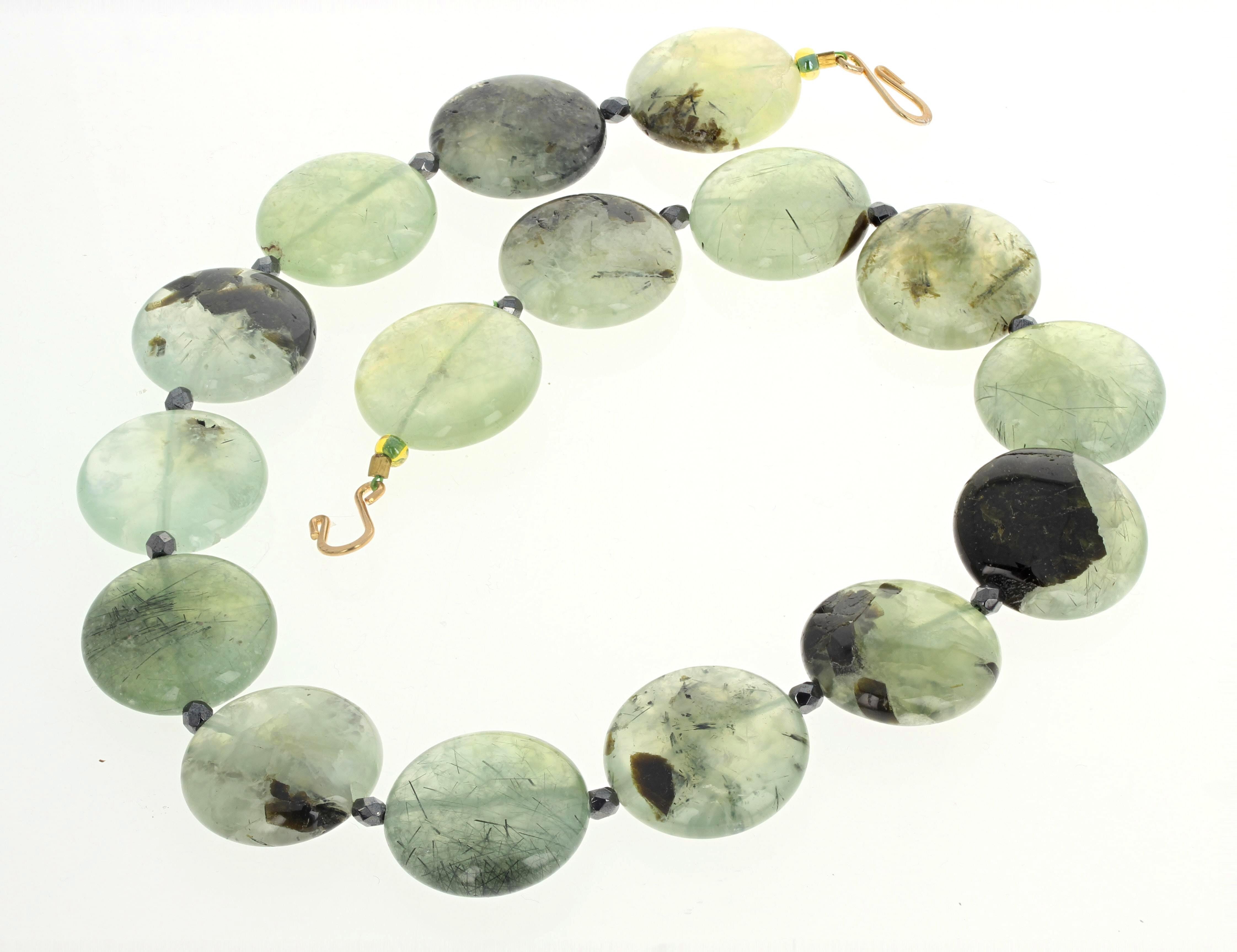 This lovely simply elegant natural Prehnite necklace is 19 1/2 inches long.  These highly polished Prehnite are approximately 25mm.  The clasp is an easy to use gold plated hook clasp.  This is wonderful to wear to lunch or to dinner.
