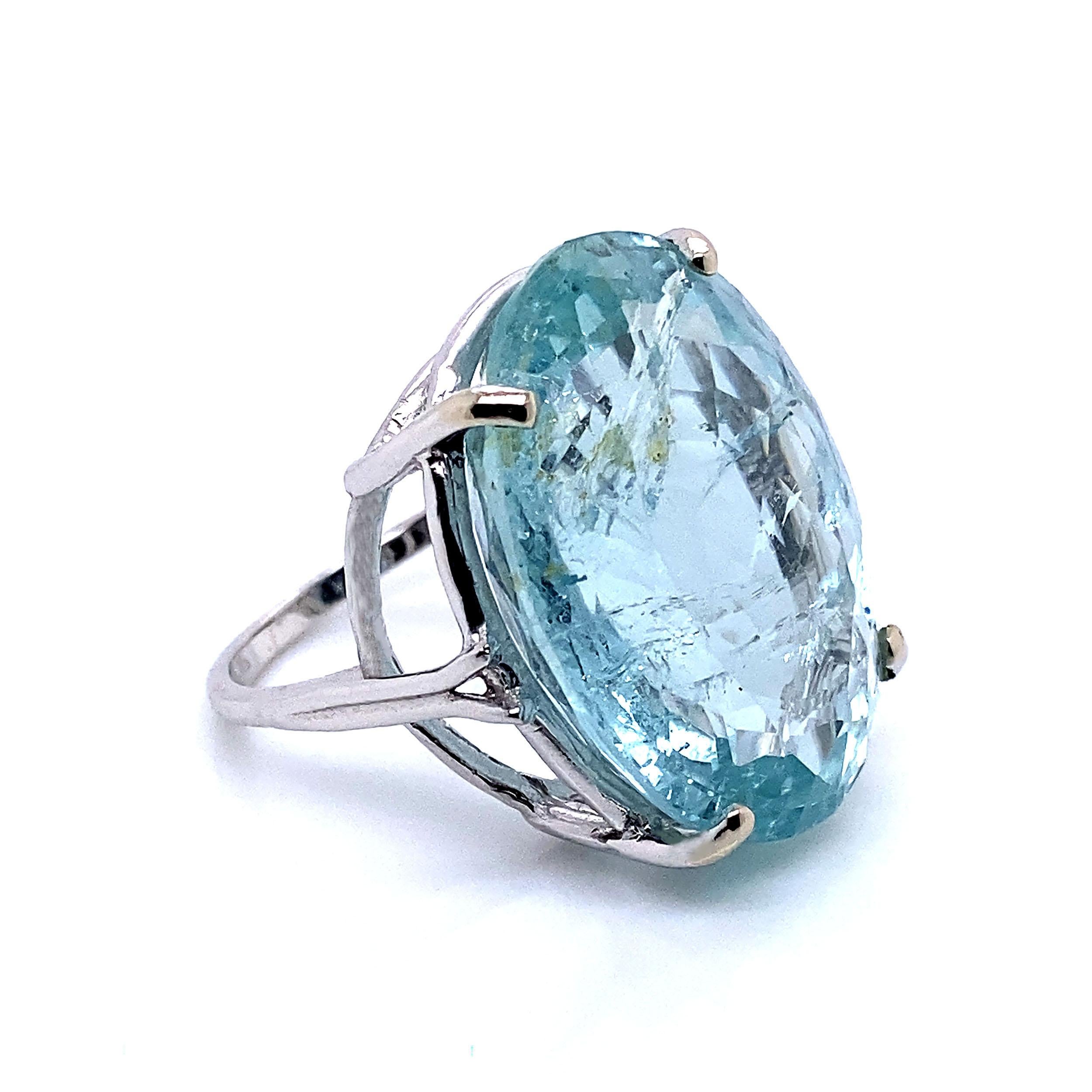 Aquamarine lovers, March Babies, here's your ring!  37 carats of sparkling Aquamarine.  This huge baby is knuckle to knuckle. Oval is always a favorite shape because is pleasing on everyone's hand.  This sparkler is set in 14K White Gold to