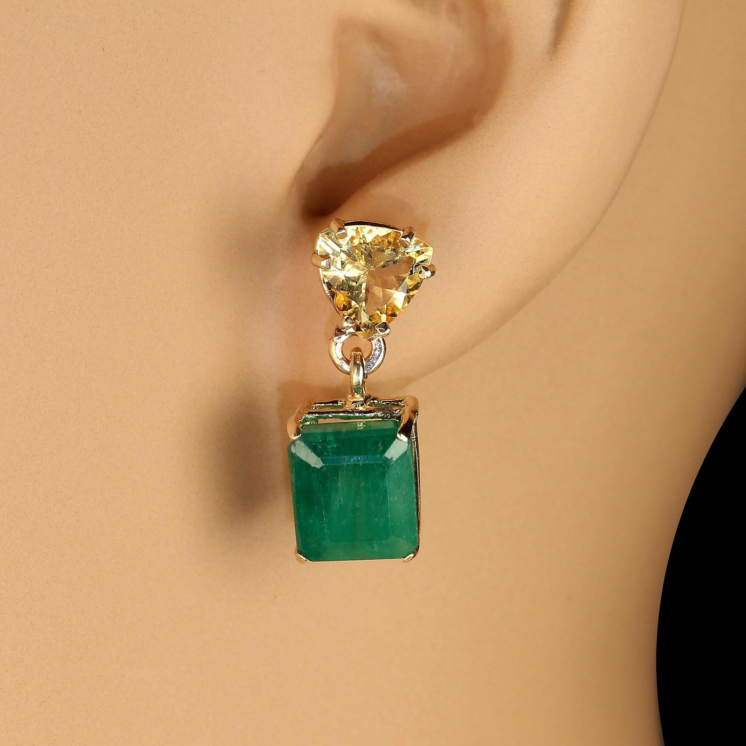 Another pair of unique earrings from the Aria Collection. 10 Carats of green, green Emeralds dangling from sparkling gold, gold golden Beryls make these earrings a 'must have' for your earring collection. These very green Emeralds are almost square