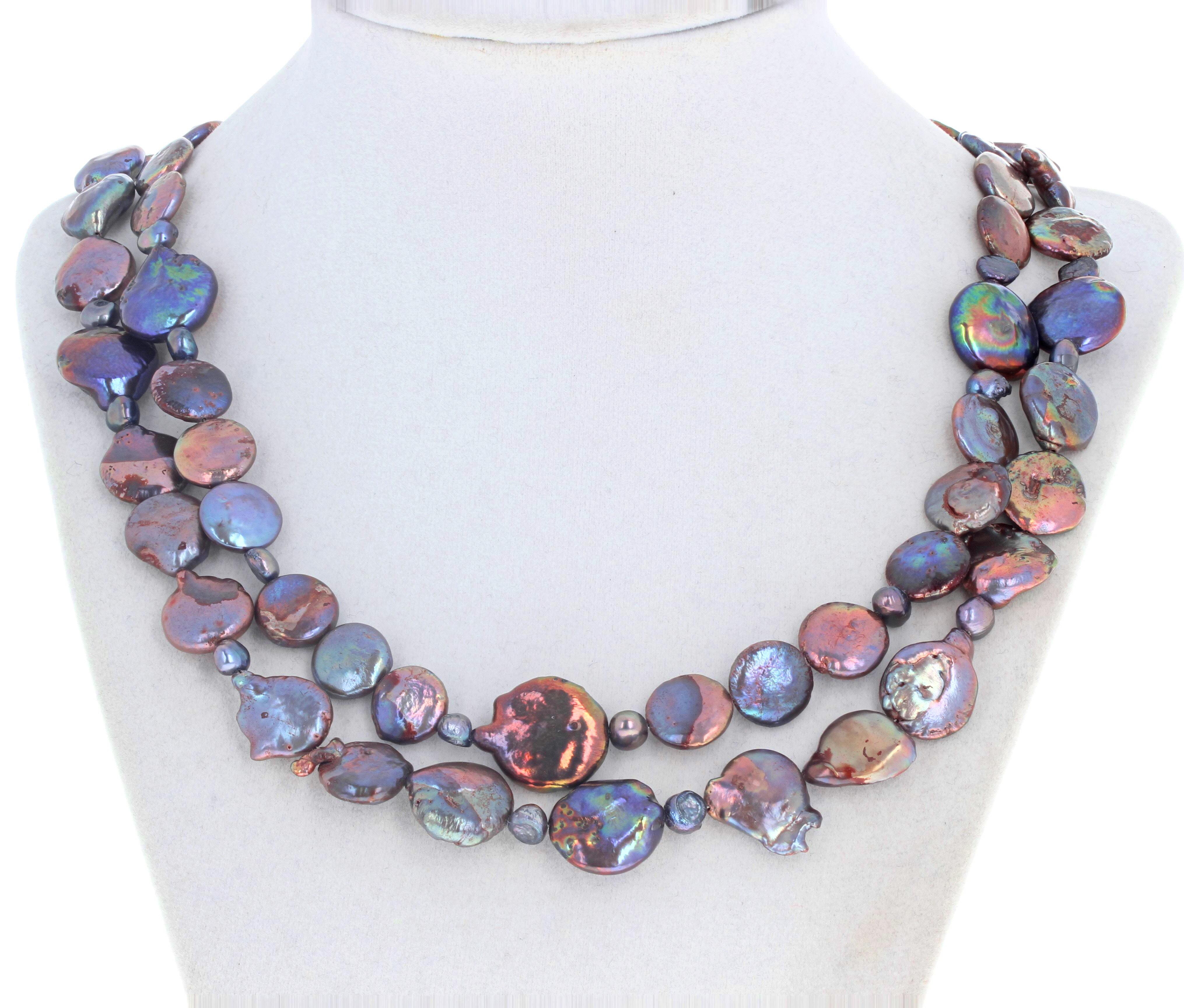This magnificent eye-catching 18 inch long natural culture Peacock Pearl necklace is a 