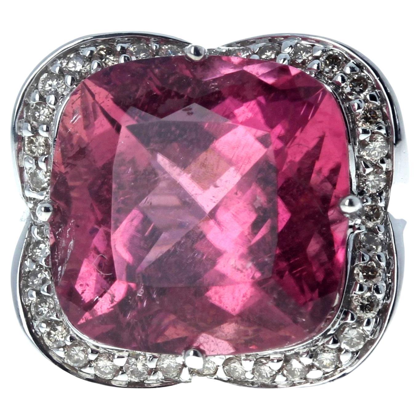 This brilliant beautiful 11.46 carat Tourmaline is 13mm x 13mm set in a white gold ring size 7.  The Tourmaline is enhanced by tiny little sparkling real white Diamonds set all the way around it.  This is sizable for free.  It is clear, sparkling,