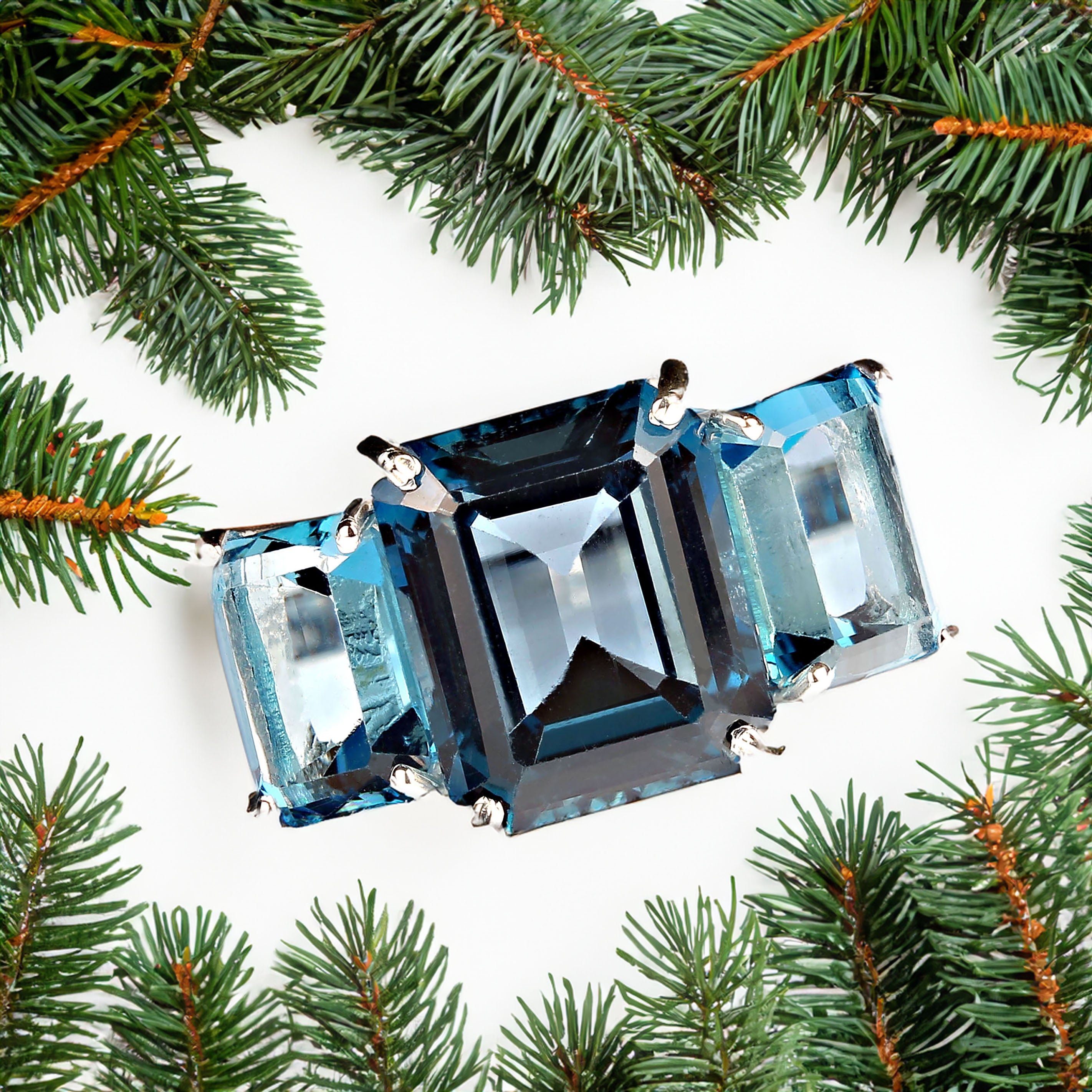 AJD Classic Three Stone Ring of Emerald Cut London Blue Topaz In New Condition For Sale In Raleigh, NC