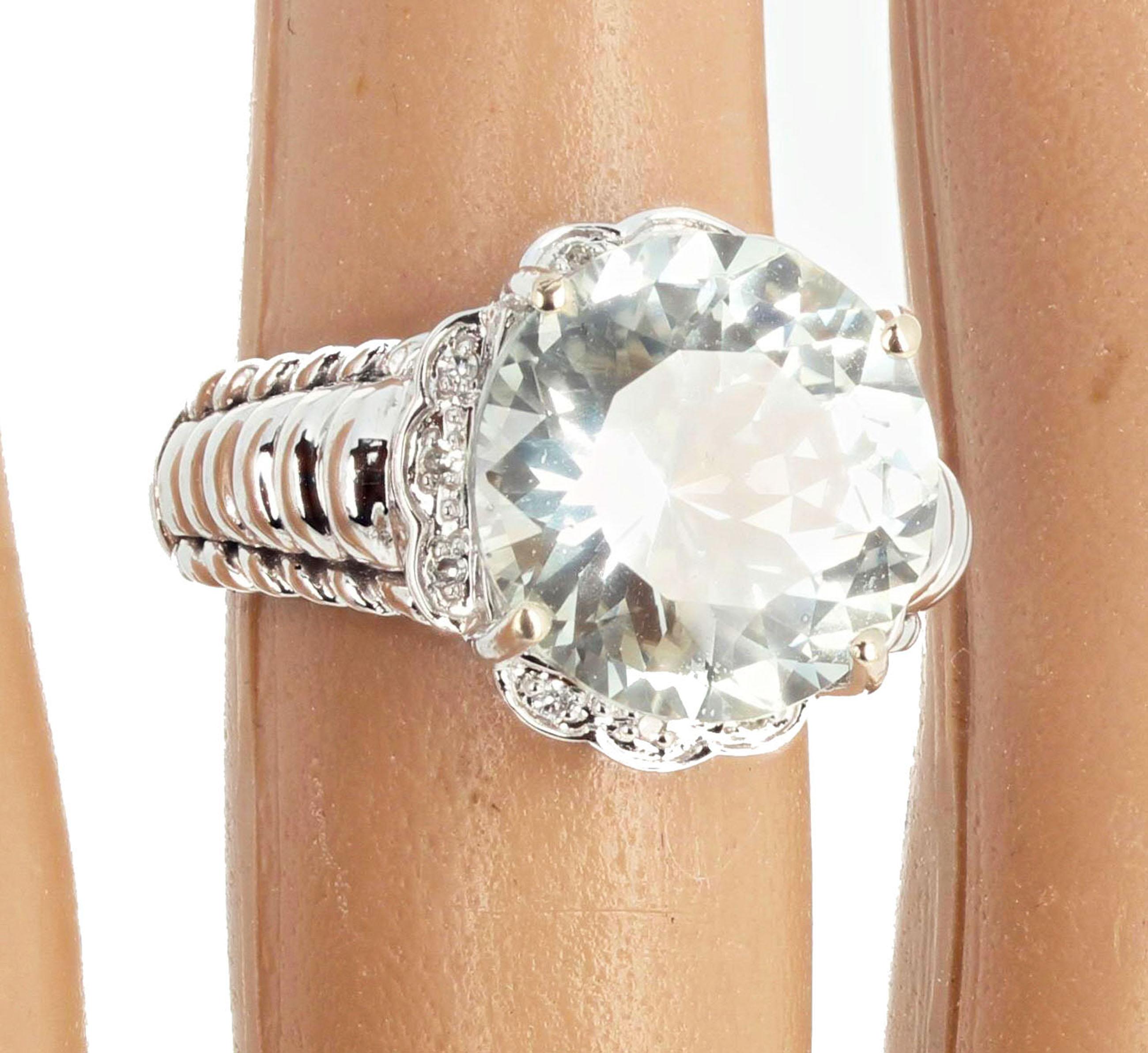 Gemjunky stand-alone EXTRAORDINARY SIZED GEMSTONE ring is not for the shy.  This huge glittering 10 CT. natural 13mm White Sapphire from Sri Lanka is enhanced with tiny little sparkling diamonds set in this lovely 14Kt white gold ring size 7