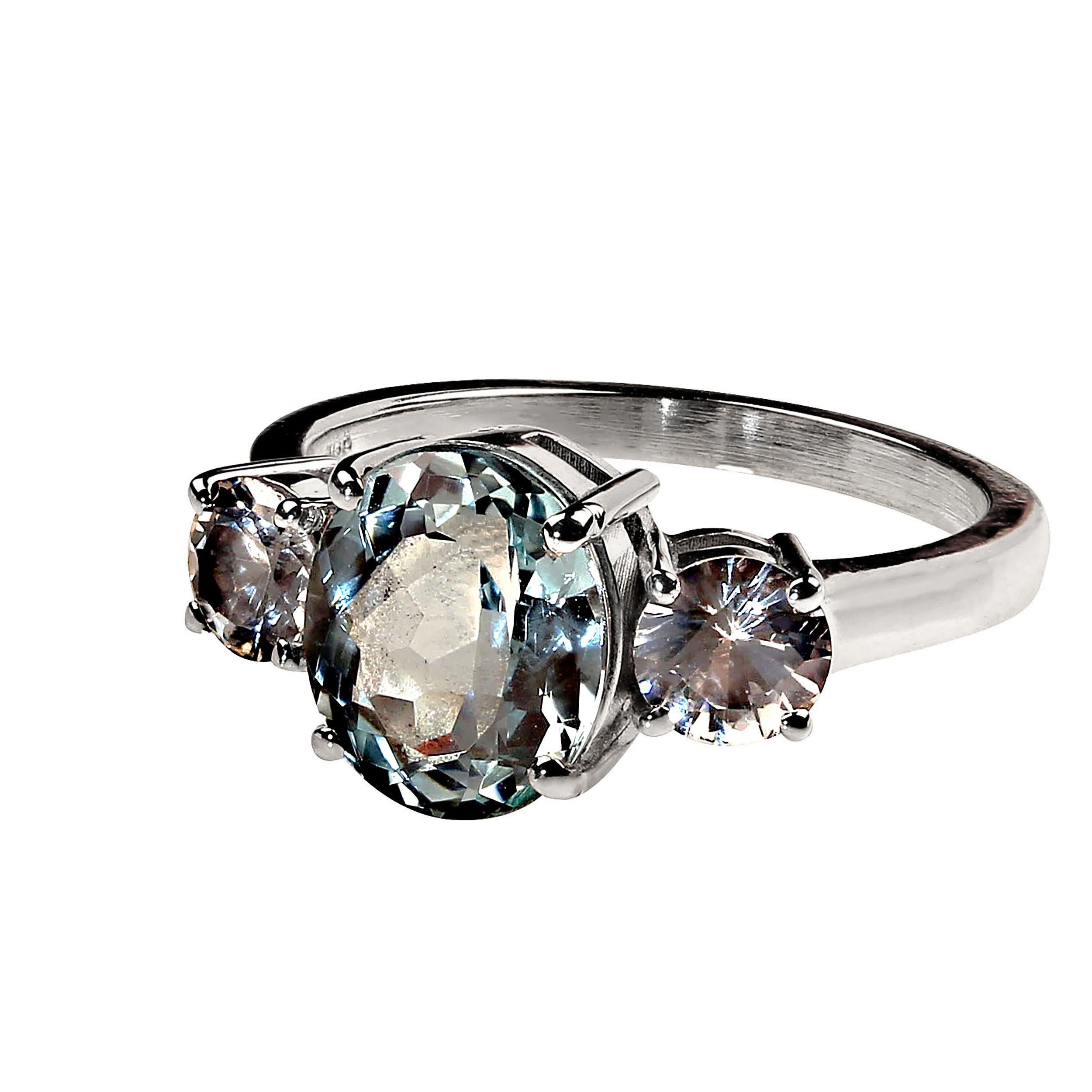 AJD Delicate 3 Carat Oval Aquamarine Accented by White Sapphires Ring In New Condition For Sale In Raleigh, NC