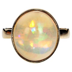 AJD Delightful Round Opal in 18KT Yellow Gold Ring