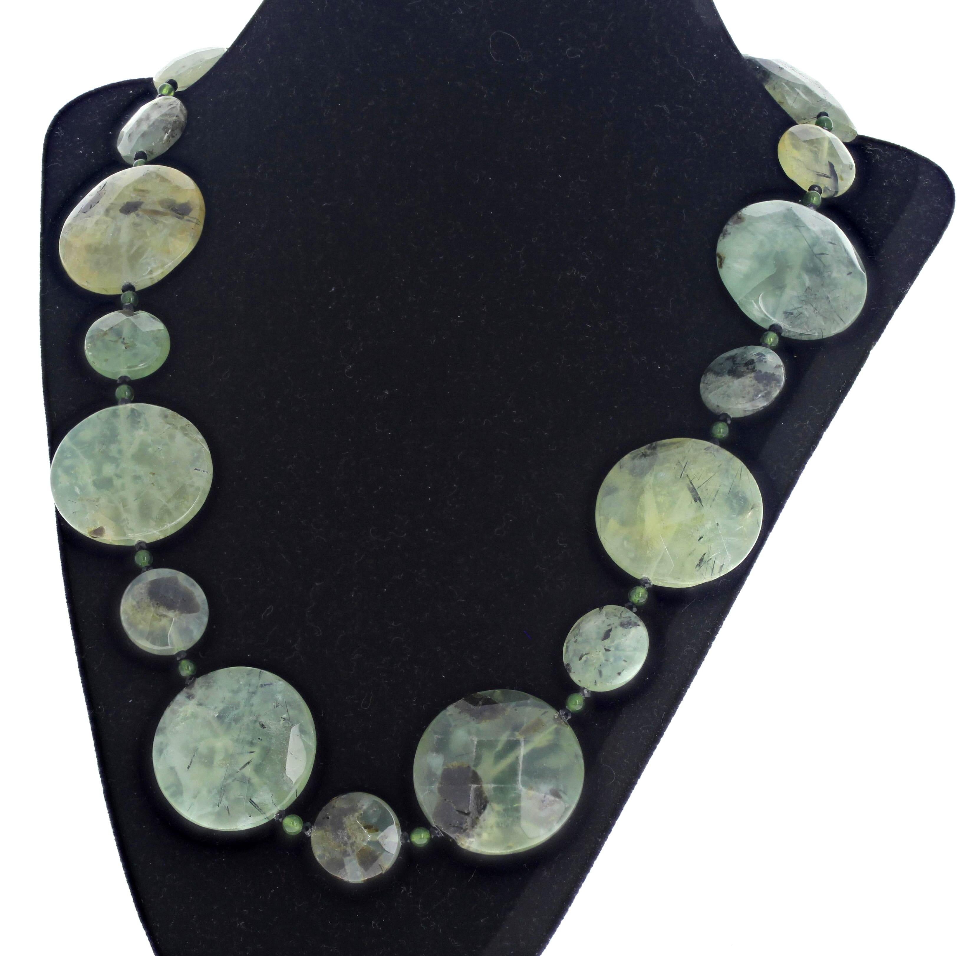 Both the beautiful green Prehnites and the little tiny Jades are all real gemstones.  The necklace is 21 inches long.  The largest Jades are approximately 30mm.  The clasp is an easy to use silver hook clasp.