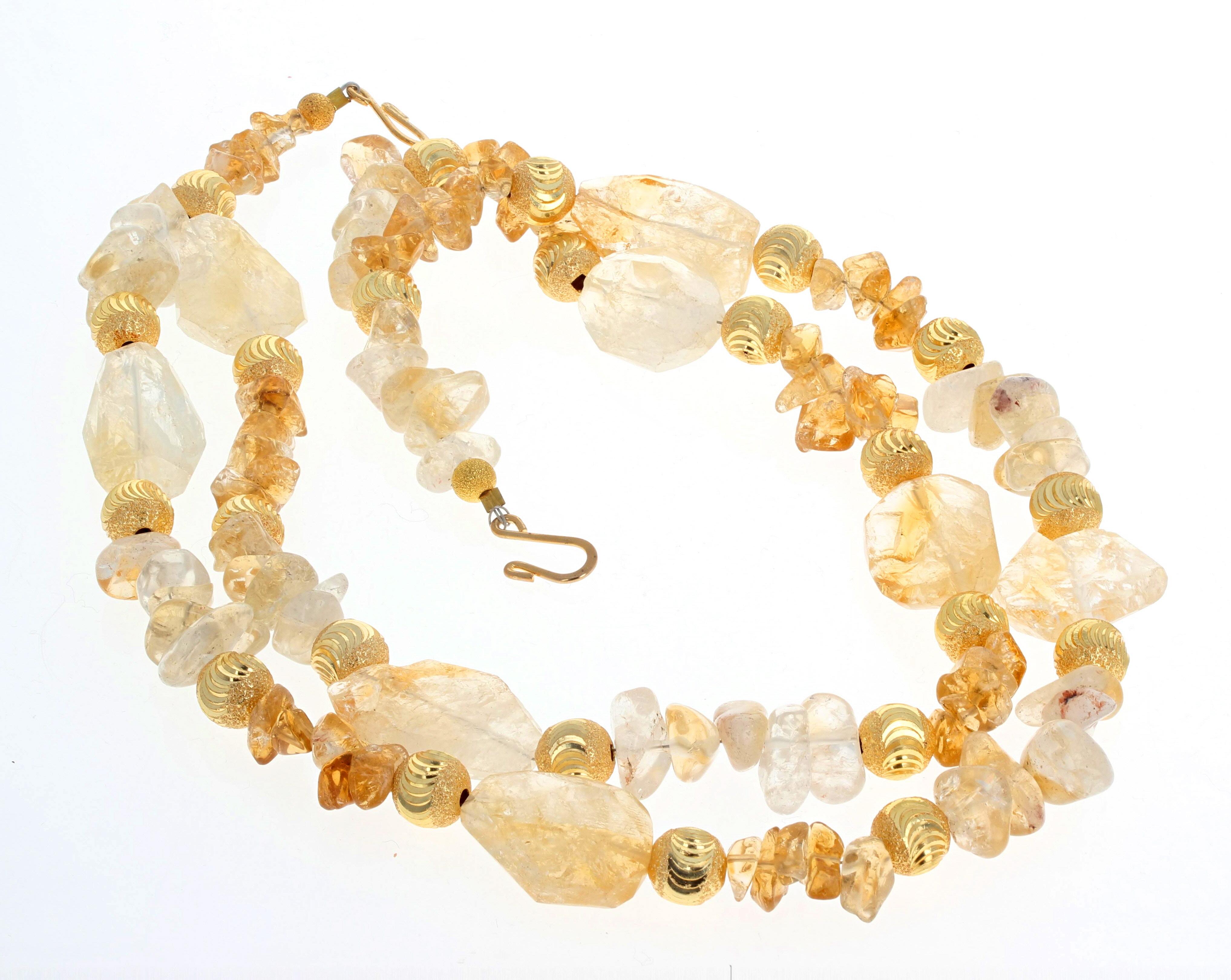 AJD Highly polished beautiful large natural Citrine gemstones in this 18 inch long necklace are enhanced by the large 10mm round gold plated rondels.  The largest of the Citrines are approximately 25mm x 17mm.  The clasp is a gold plated easy to use