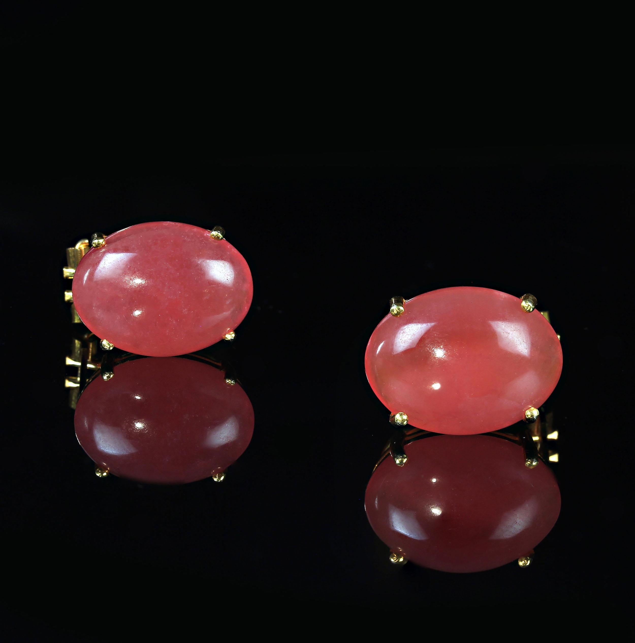 Favorite oval cabochon Rhodochrosite earrings set in gold rhodium over Sterling Silver. These earring have a lever back in addition to the post for comfort and ease of placement on  your ear.  The total weight is 16.71carats and the gorgeous