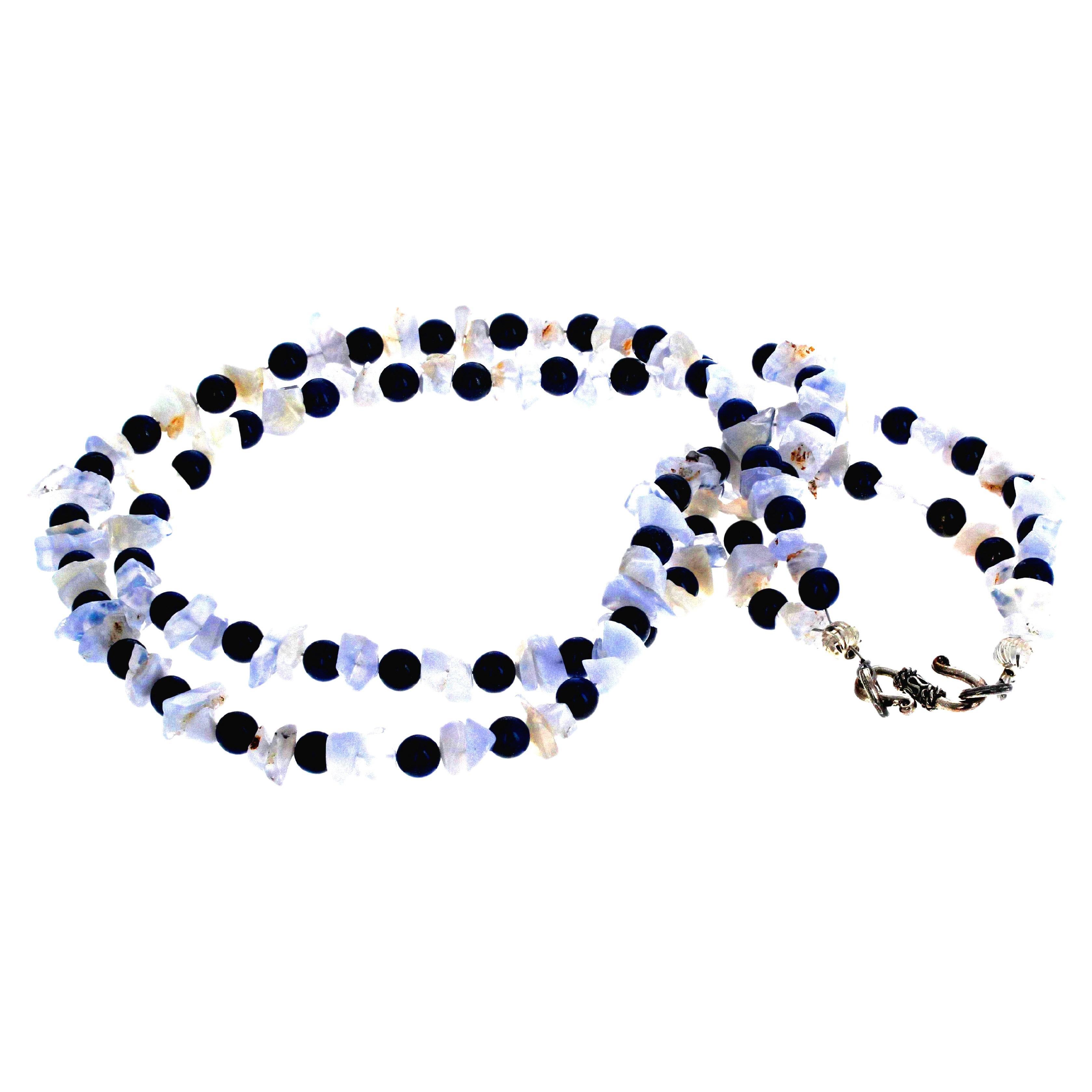 This lovely natural blue Chalcedony enhances the highly polished natural blue Lapis Lazuli rondels.  The Lapis are approximately 6 1/2mm and the Chalcedony chips are fascinating partially translucent gems.  The clasp on this lovely double strand