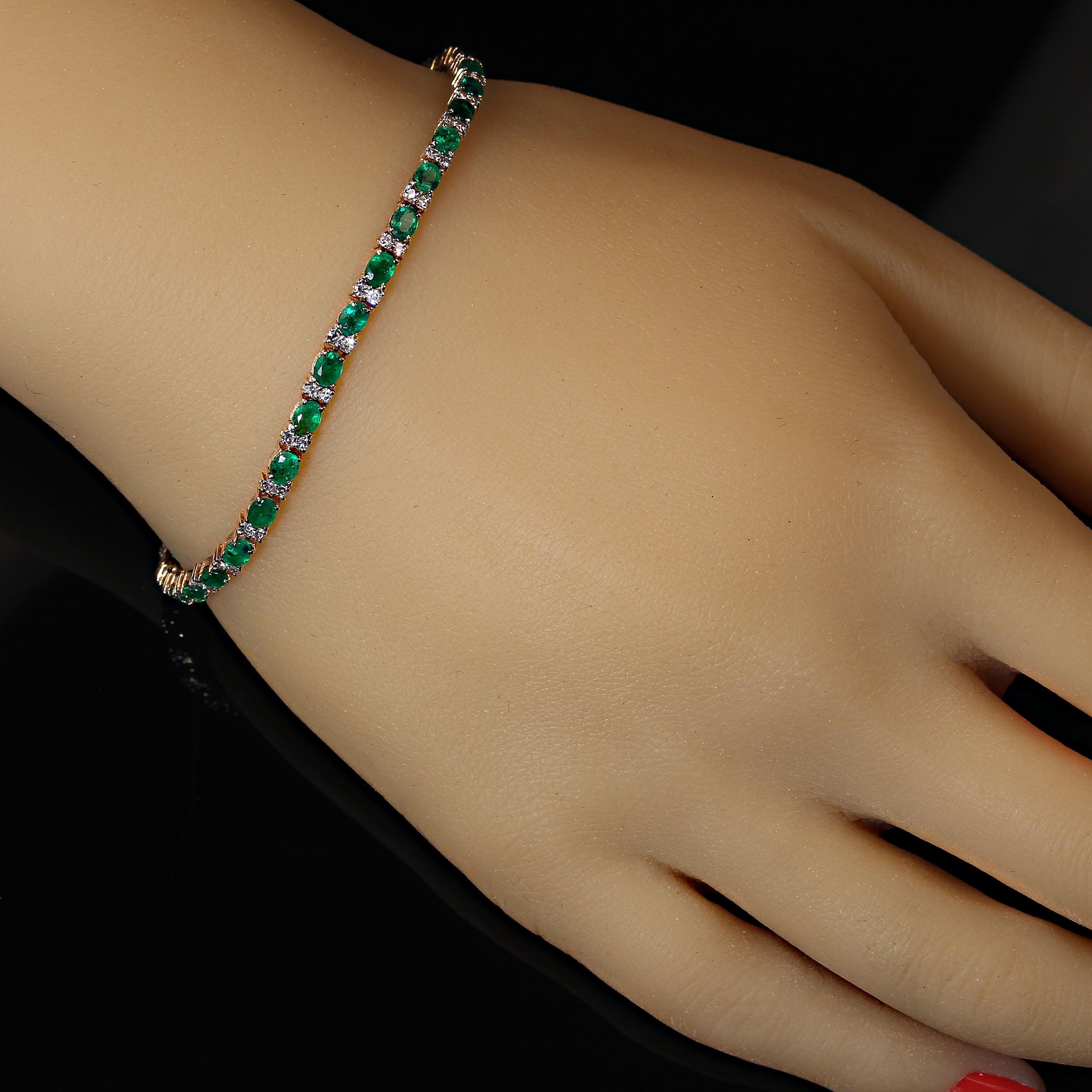 Lovely, elegant emerald bracelet to grace your wrist.  This 7 inch 14KT rich yellow gold bracelet is such a delight to wear, you won't want to remove it. The emeralds are set end to end.  The diamonds are set in pairs  between each emerald equaling