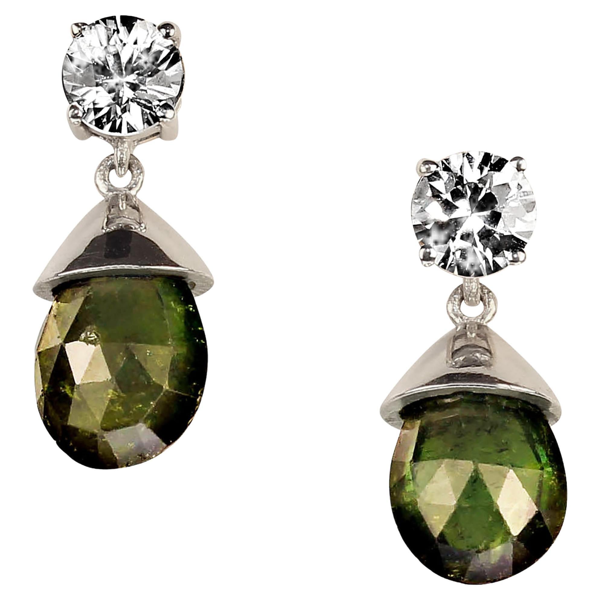 Sparkling Zircons and green Tourmaline earrings.  These lovely gemstones are set in Sterling Silver, with post backs.  The zircons weigh 2.48ct, and are 6MM.  The green briolette Tourmalines weigh 8.98 ct. The earrings have a drop of 0.75 inches. 