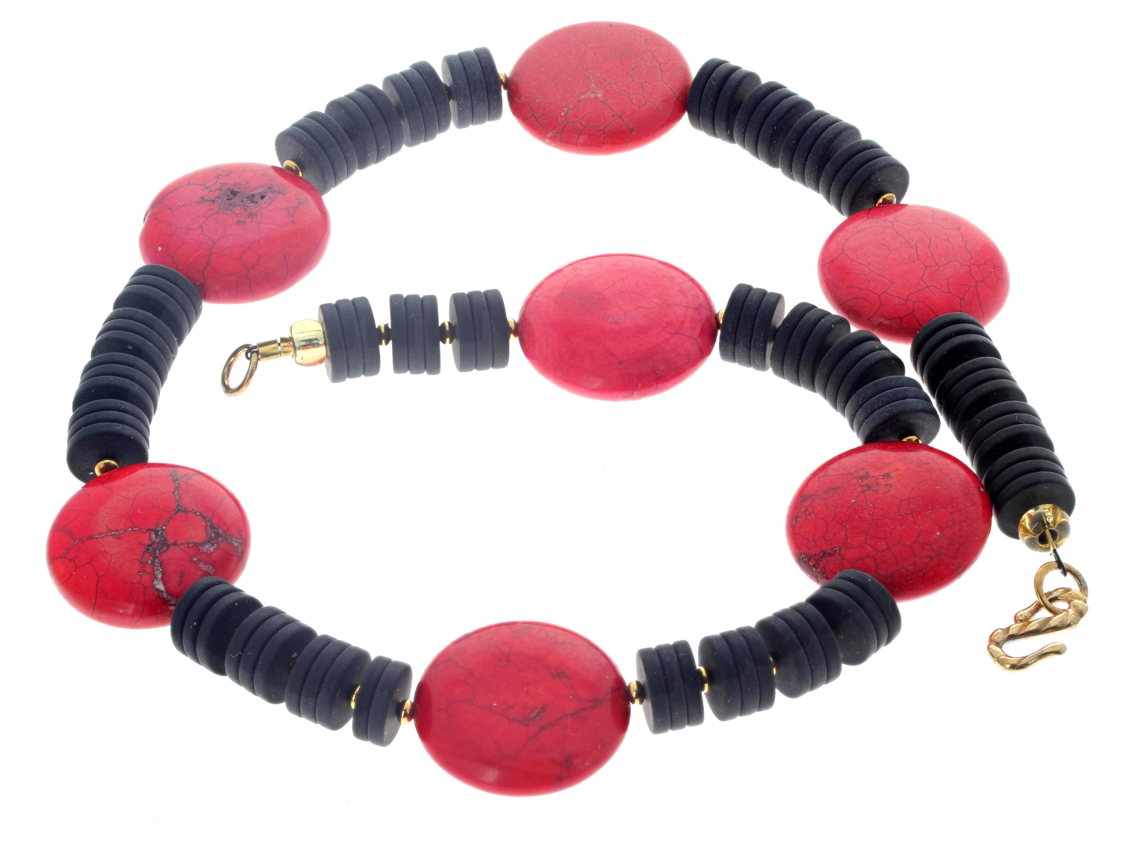 This beautiful natural Black Onyx and red Magnesite  necklace is 18 1/2 inches long.  The largest round red Magnesites are approximately 25mm and the the black Onyx are approximately 10mm.  The gold plated clasp is an easy to use hook clasp.  