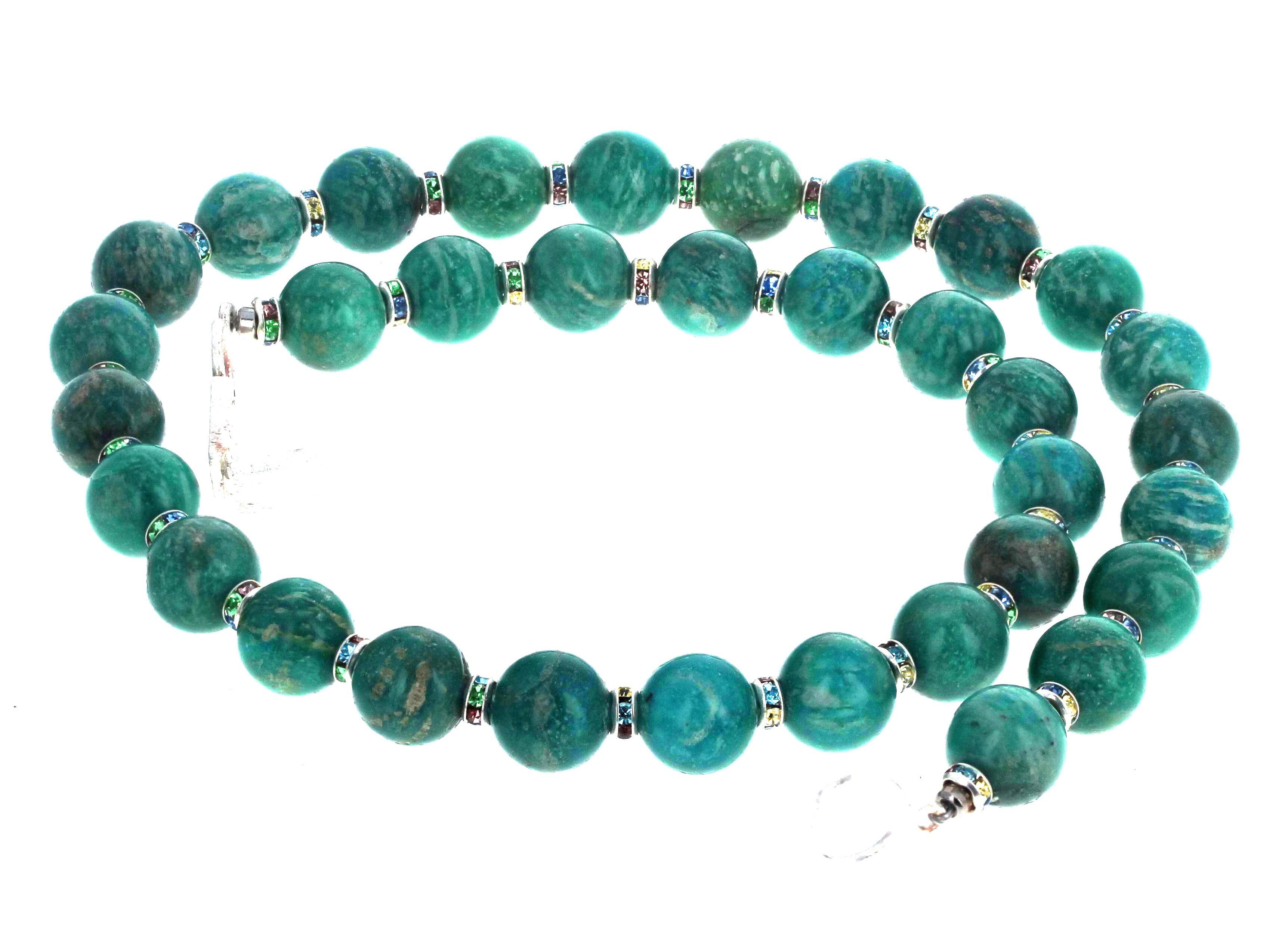 Beautiful natural real highly polished round Amazonites (approximately 12mm each) enhanced with little sparkling rondels.  This necklace is 21 inches long and the clasp is an easy to us simple flip-on clasp.  This is hugely elegant to wear to lunch