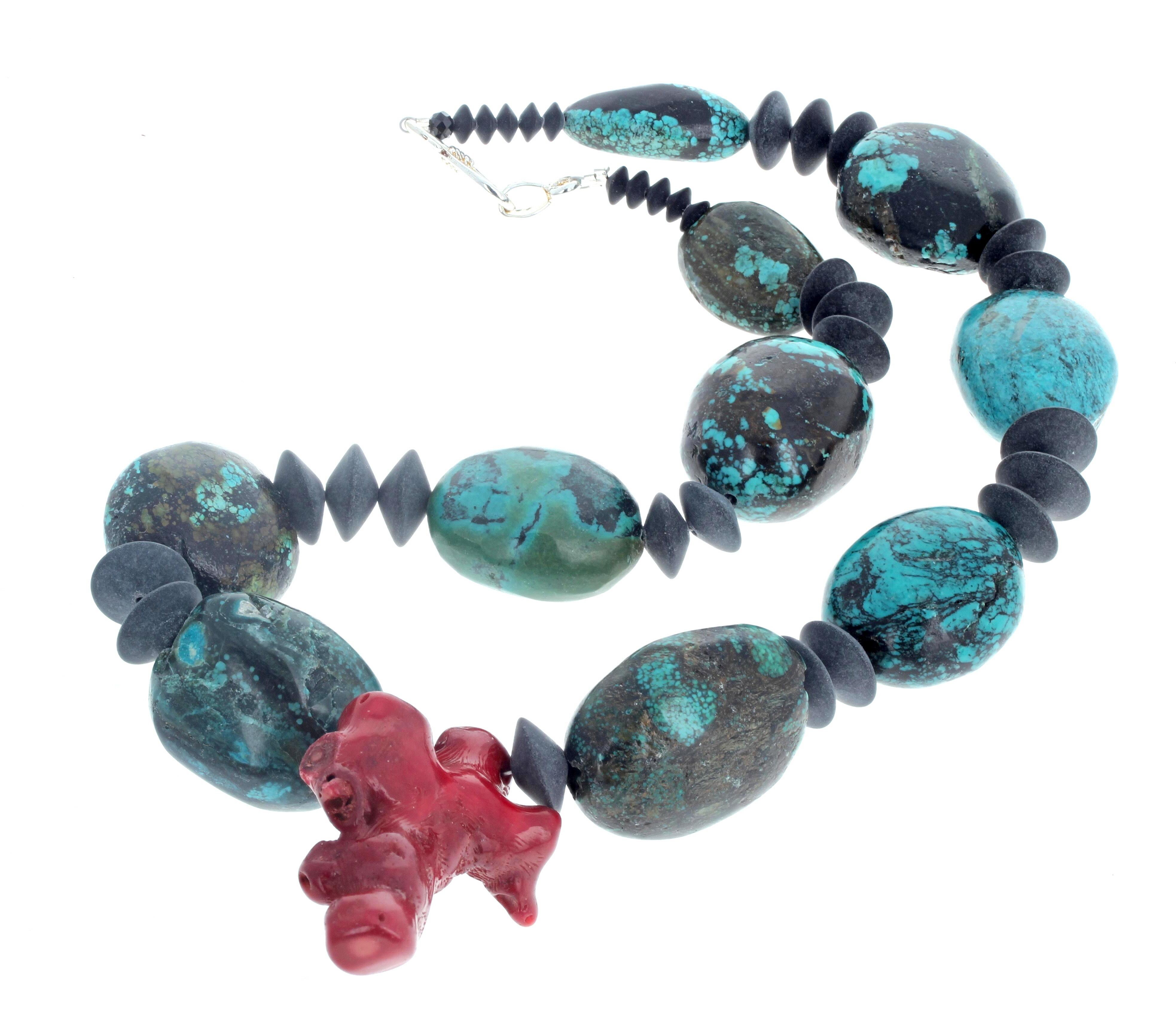 This fascinating statement real natural Turquoise is enhanced with large black Onyx rondels and swings a magnificent red Coral pendant in its center. The beautiful Tuquoise are approximately 30mm x 27mm and the largest Onyx are approximately 13.5mm.
