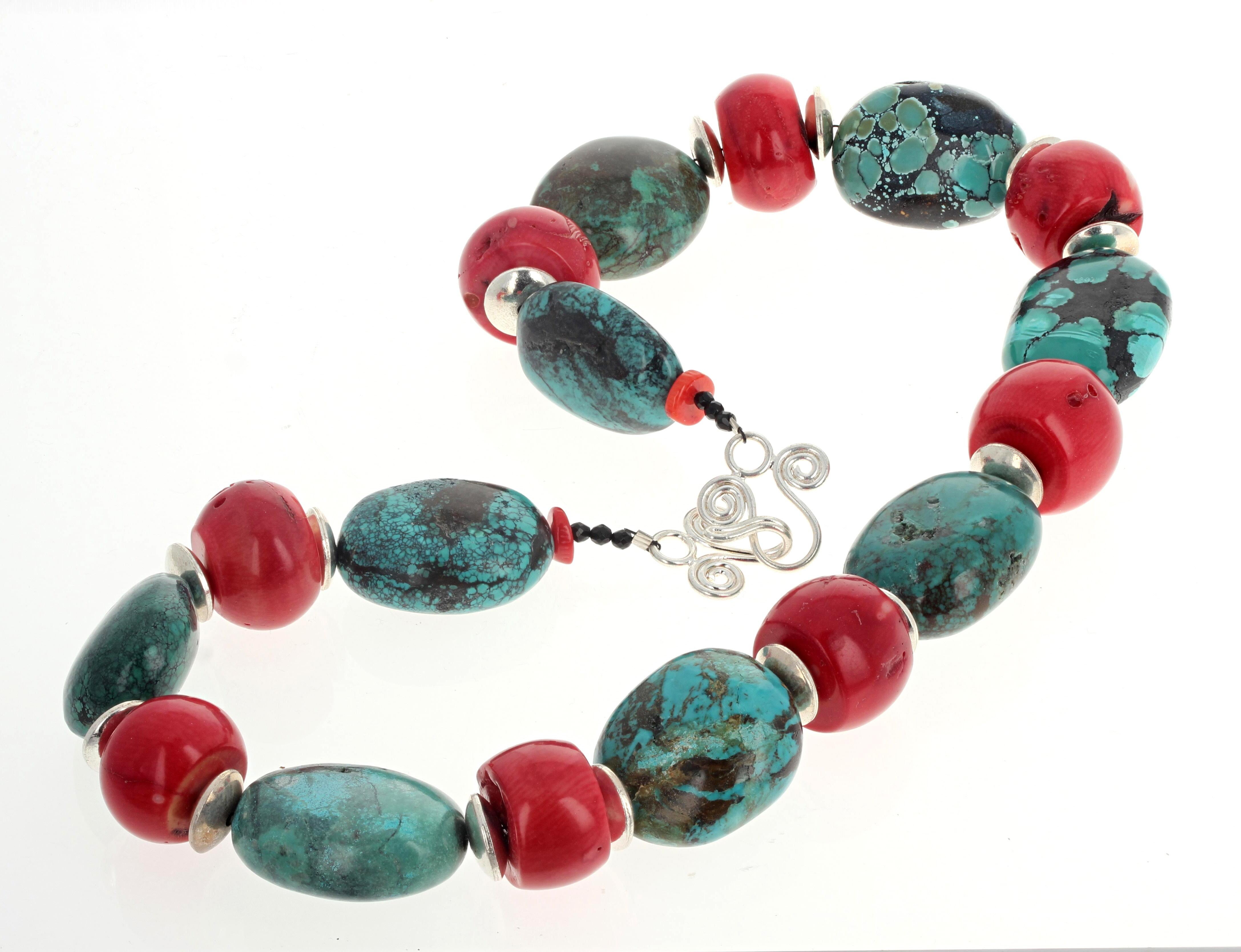 This beautiful single strand of highly polished natural Turquoise and real natural red Coral is 21 inches long.  The simple elegant spacers are silvery rondels (12mm).  The largest Coral is approximately 13mm round-ish and the largest Turquoise is