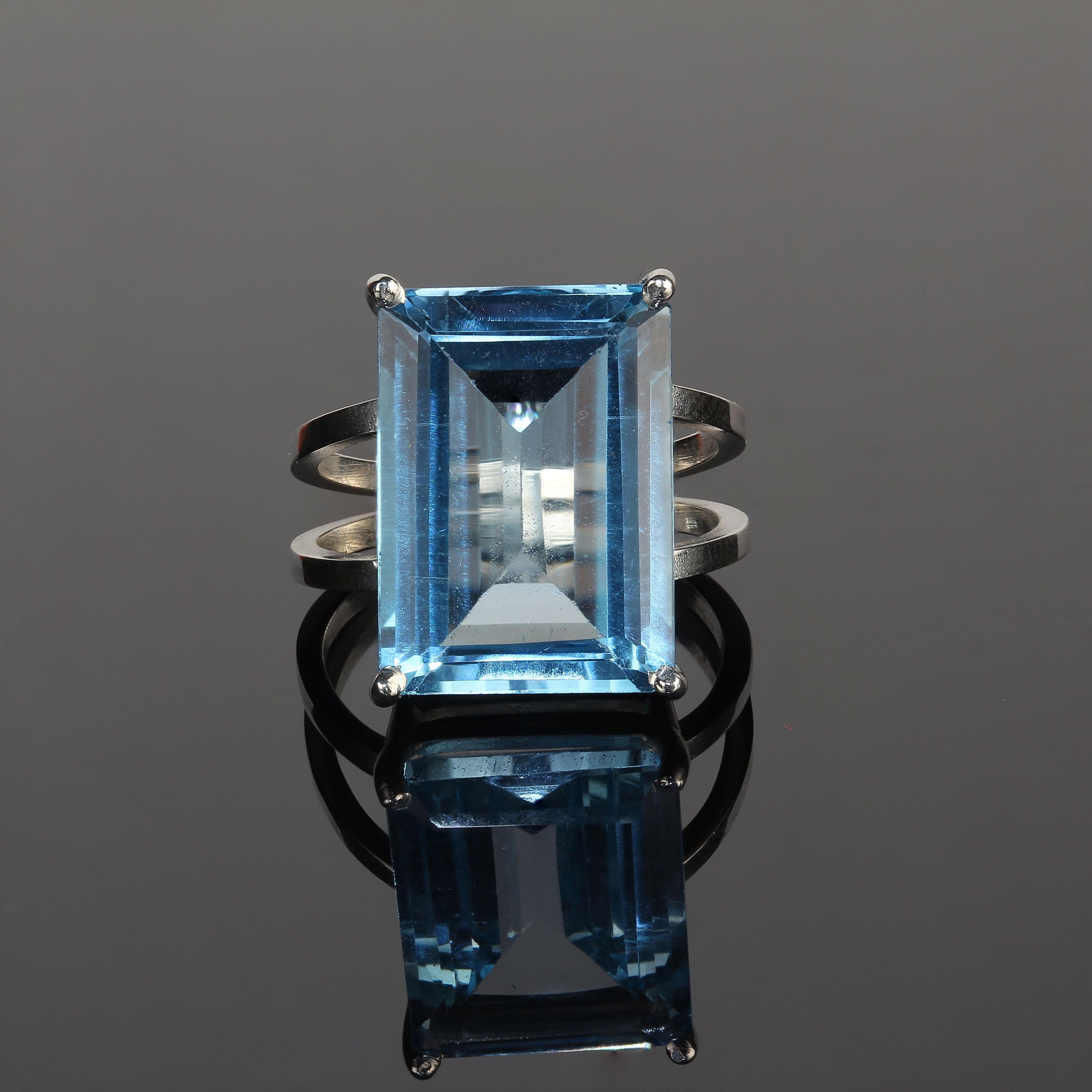 Artisan AJD Exciting 16 Carat Emerald Cut Sky Blue Topaz and Sterling Silver Ring For Sale