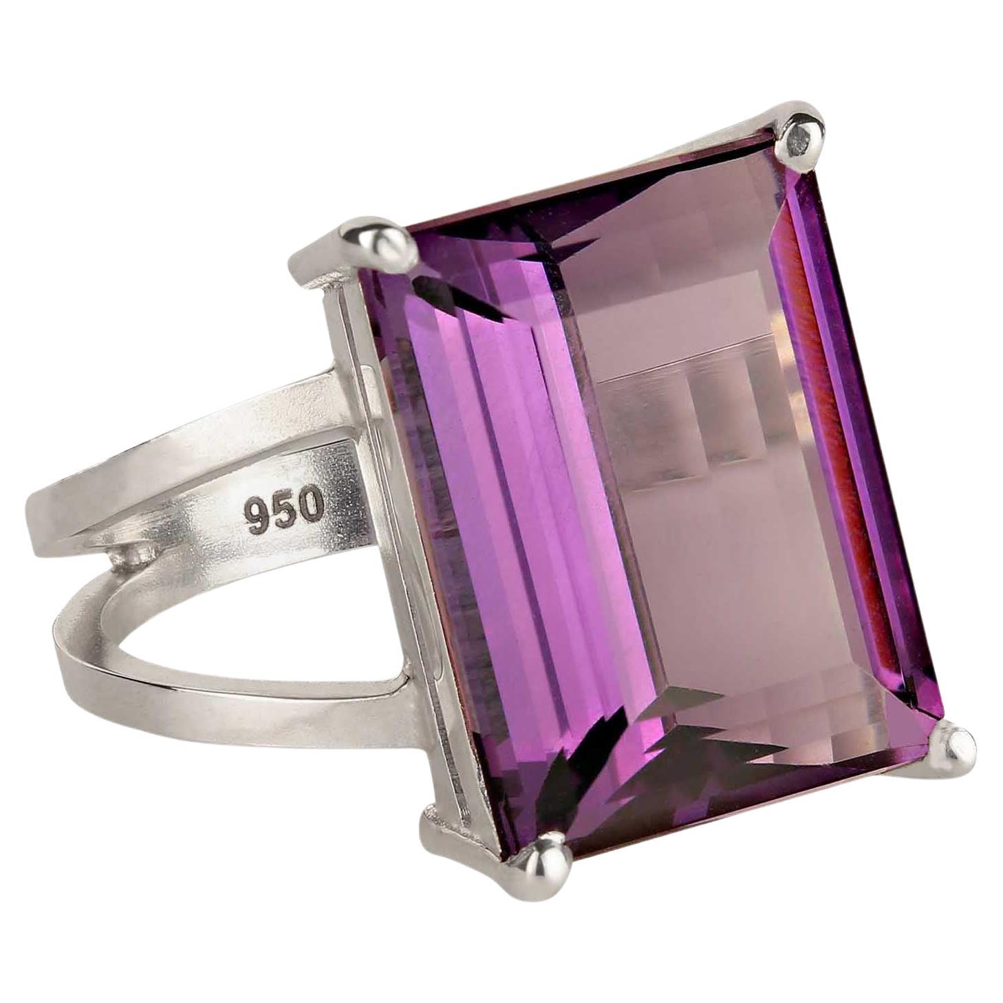 Exciting emerald cut 12Ct Amethyst and Sterling Silver ring.  This 16x12MM gemstone is set in a custom made Sterling Silver setting and the entire package comes from our favorite vendor in Belo Horizonte, Minas Gerais, Brasil. Amethyst is the
