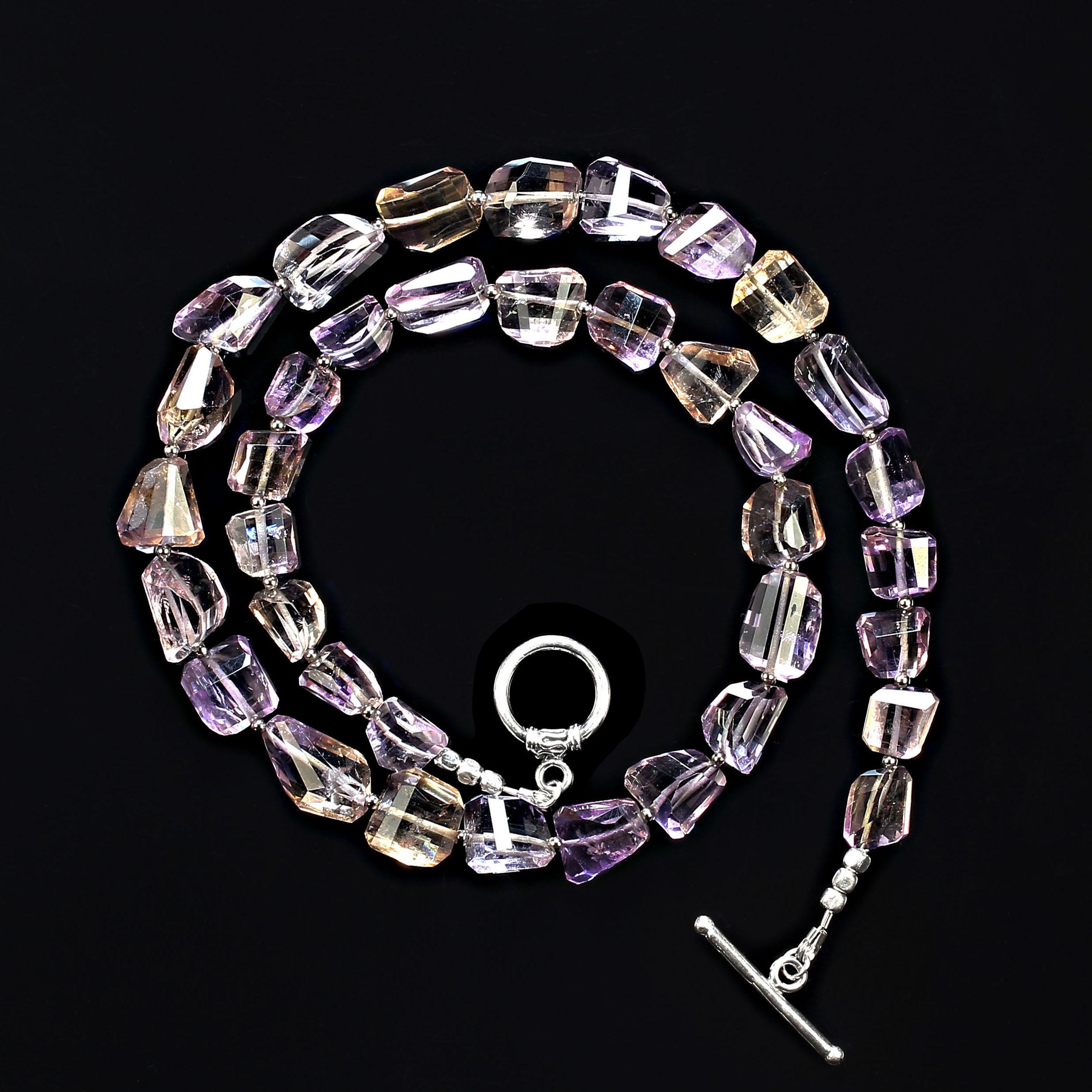 20 inch faceted freeform Ametrine with time silver tone accent. The clasp is a silver tone easy to use toggle.  Remember that Ametrine is a combination of amethyst and citrine in the same gemstone. MN3555  