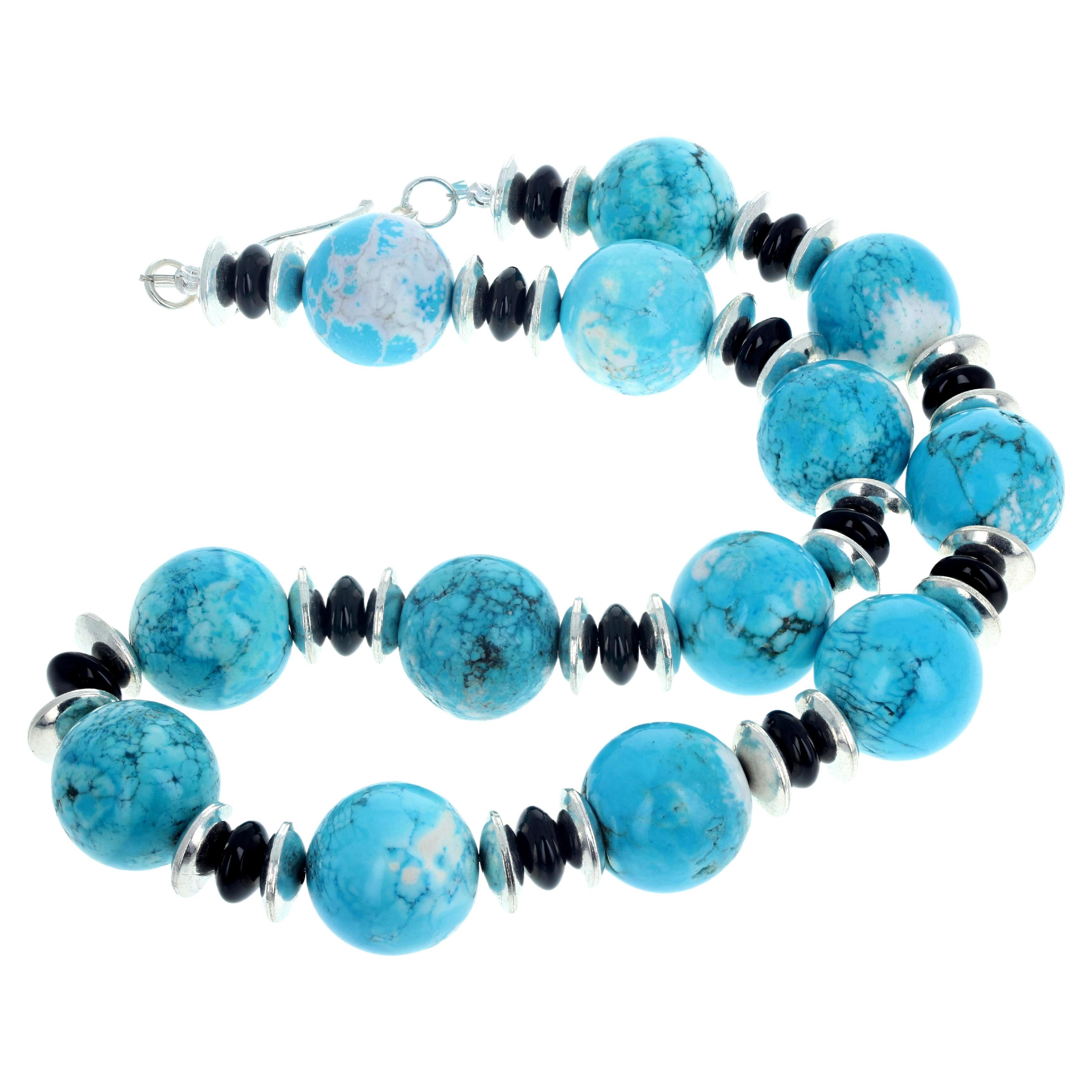 This highly polished big round natural blue Magnesites -calcite - (approximately 20mm) - are enhanced with natural highly polished real sparkling Black Onyx rondels (approximately 10mm) and silver rondels (approximately 12mm).  The clasp on this