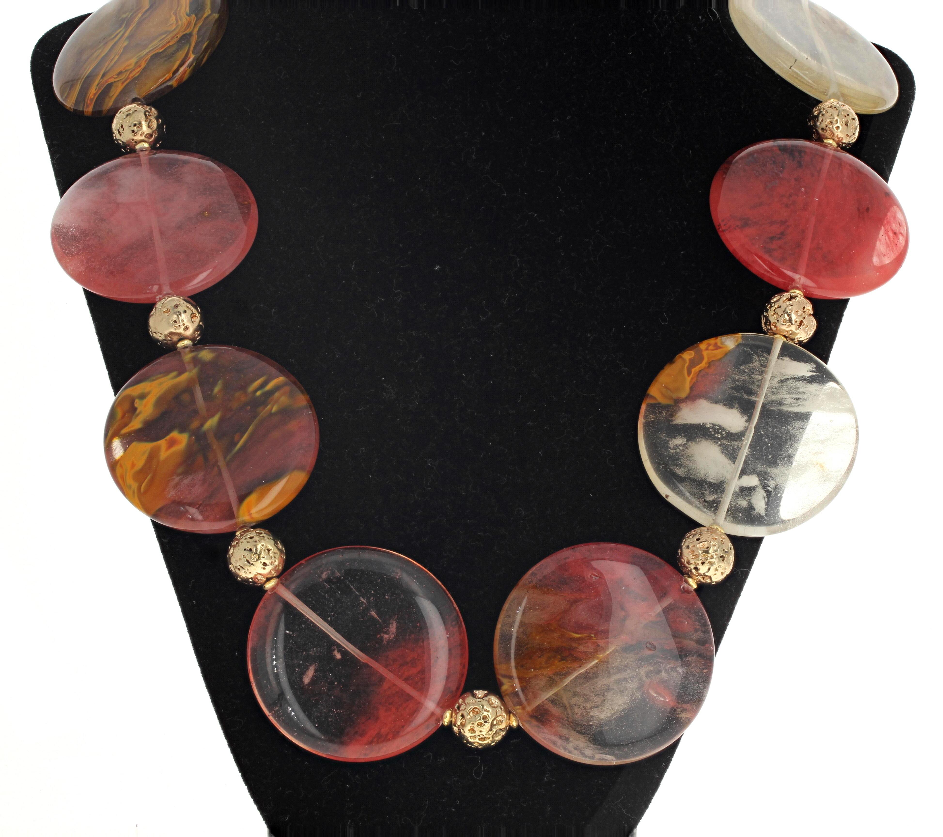 These fascinating highly polished Agates are approximately 49mm, are beautifully translucent, and are enhanced with beautiful gold plated rondels (approximately 10mm) in this 22 inch long necklace.  The clasp is a gold plated easy to use hook clasp.