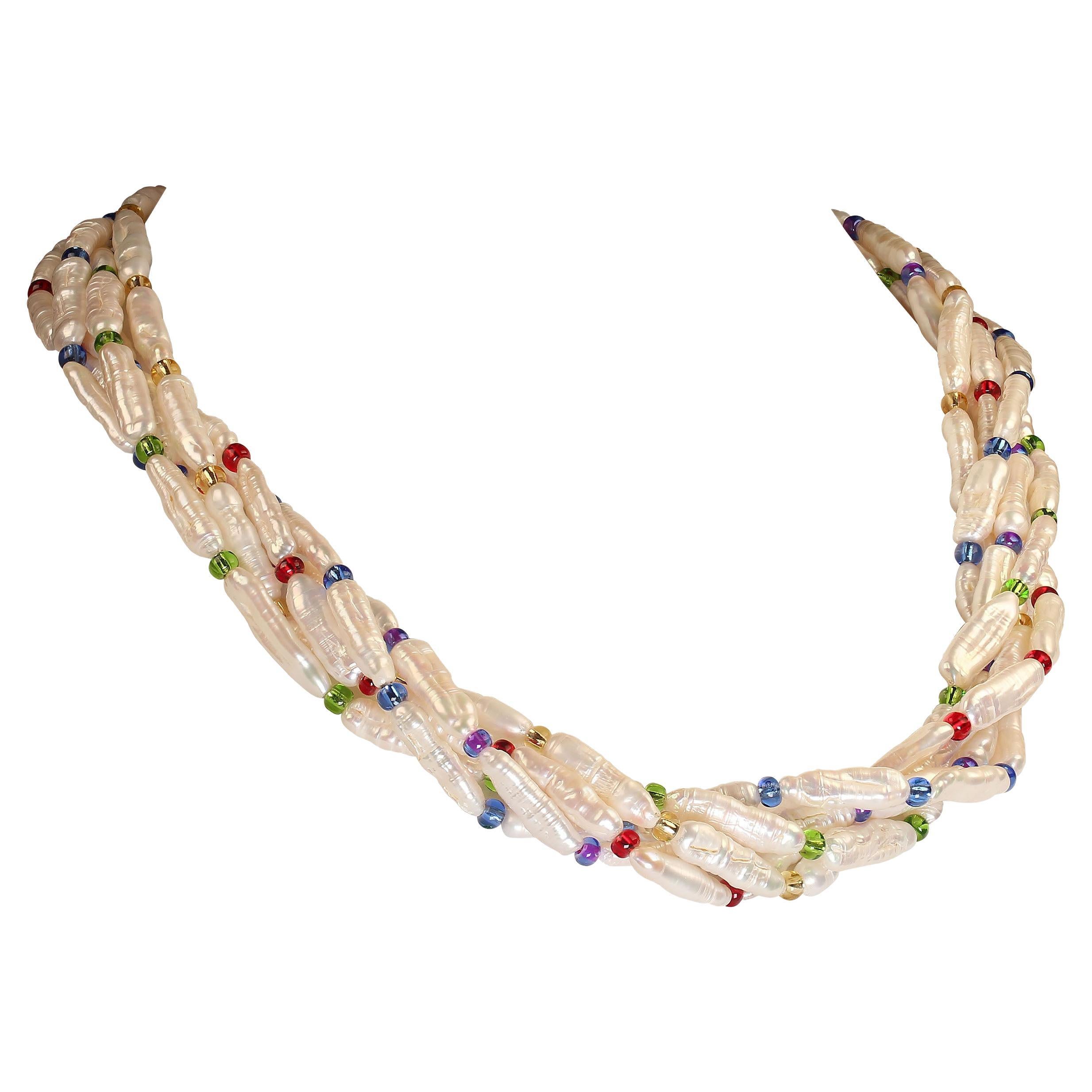 'Put on your Pearls Girls'  Lulu Guinness

Bright Statement Necklace of Pearls and Five colors of Czech beads:  Red, Blue, Green, Gold, and Purple.  The necklace features a gold tone filigree box clasp which can easily be a focal.  The long, barrel