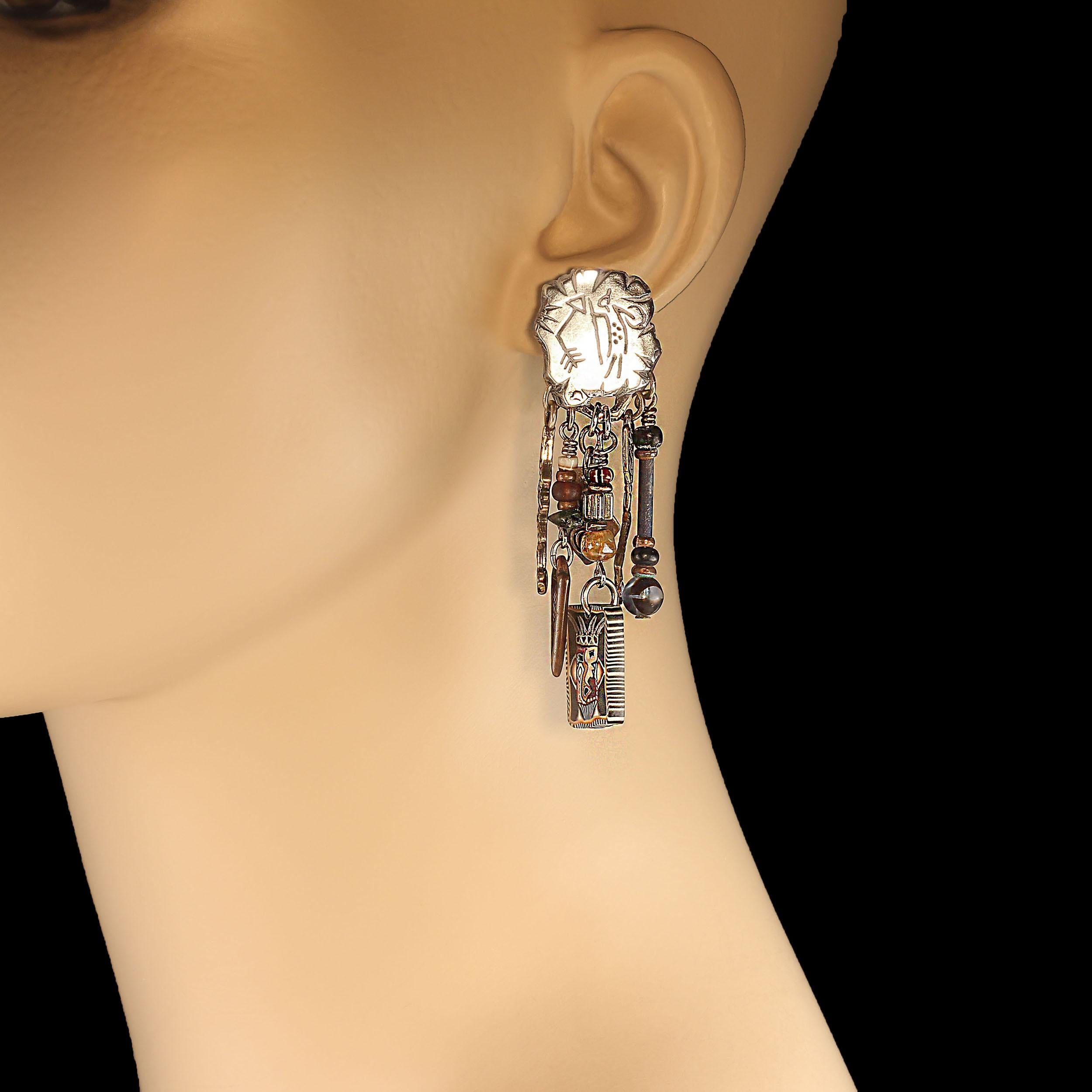 Fun & Funky Clip-On Earrings with Mixed Bead and Metal Art Dangles – 2.5 Inches

Add a playful touch to your style with these fun and funky clip-on earrings, perfect for those who love bold, artistic accessories. These earrings feature six unique