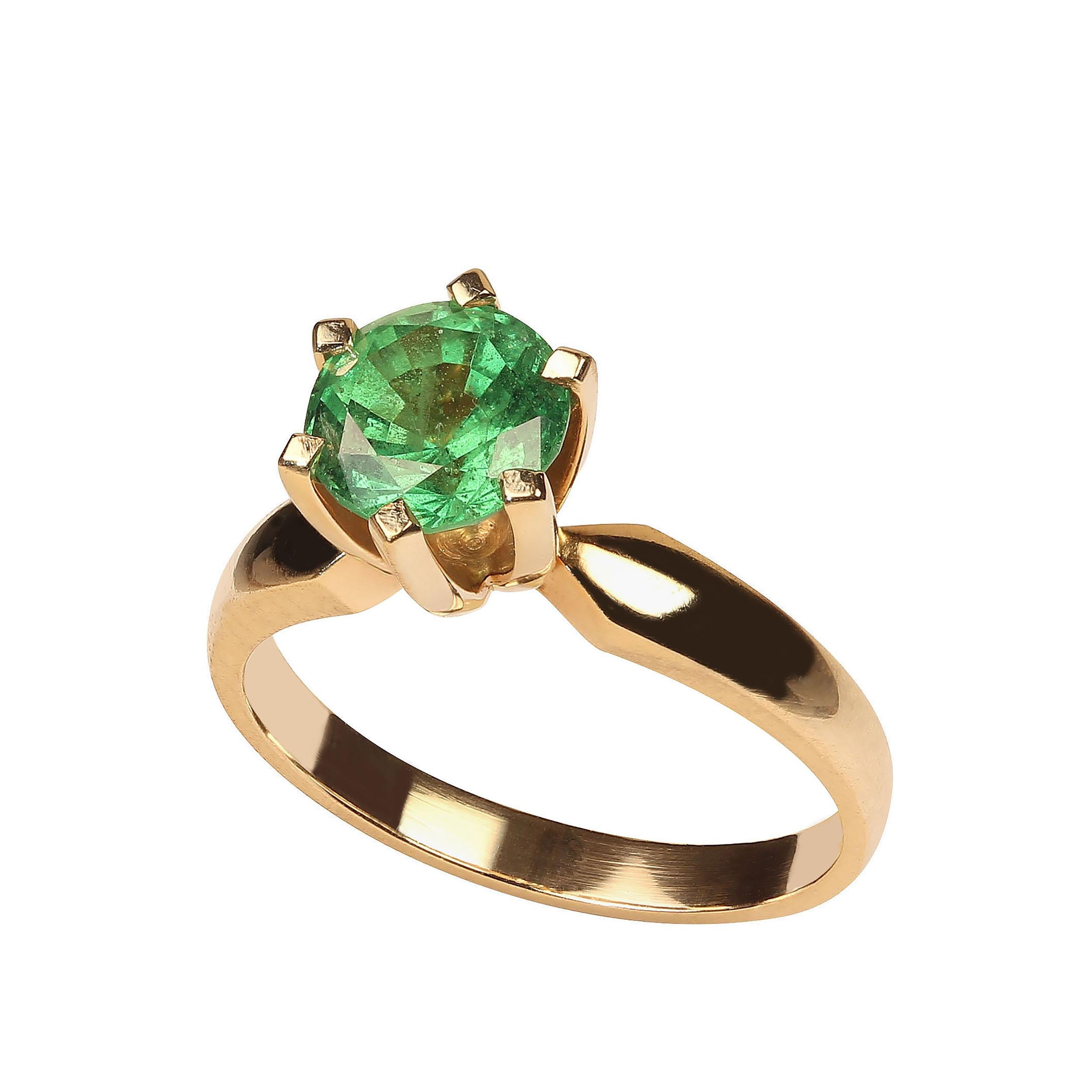 Stylish, elegant 6.7 MM brilliant green Tsavorite Garnet, est 1.0 ct. set in a classic six prong rich 18K yellow gold hand made setting.  This lovely gemstone comes straight from one of our favorite suppliers in the mountains outside of Rio de
