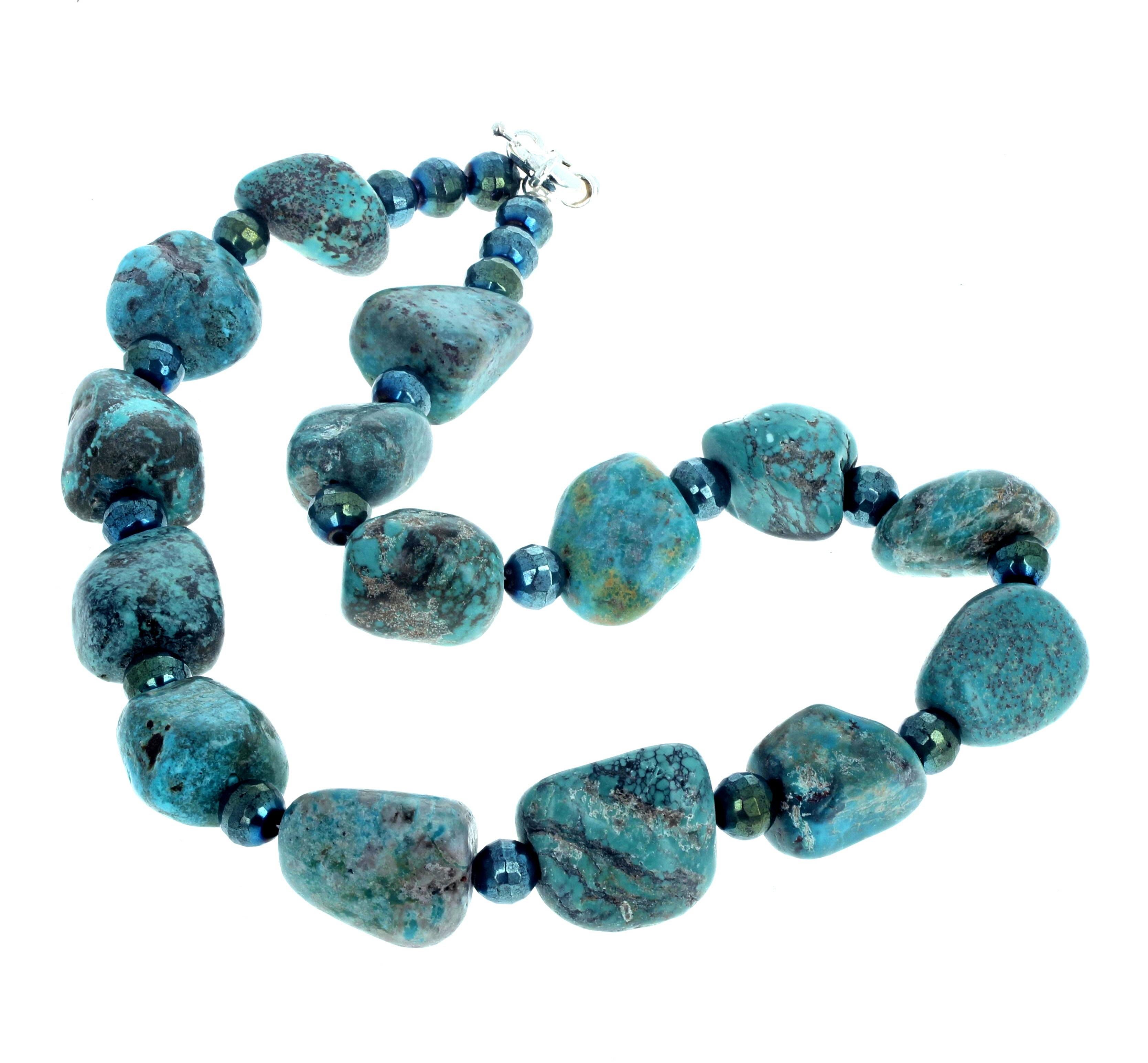 This fascinating chunky polished real natural Turquoises are enhanced with round highly polished Azurite-Malachite rondels in the 19 inch long necklace.  The easy to use clasp is round and is silver.  