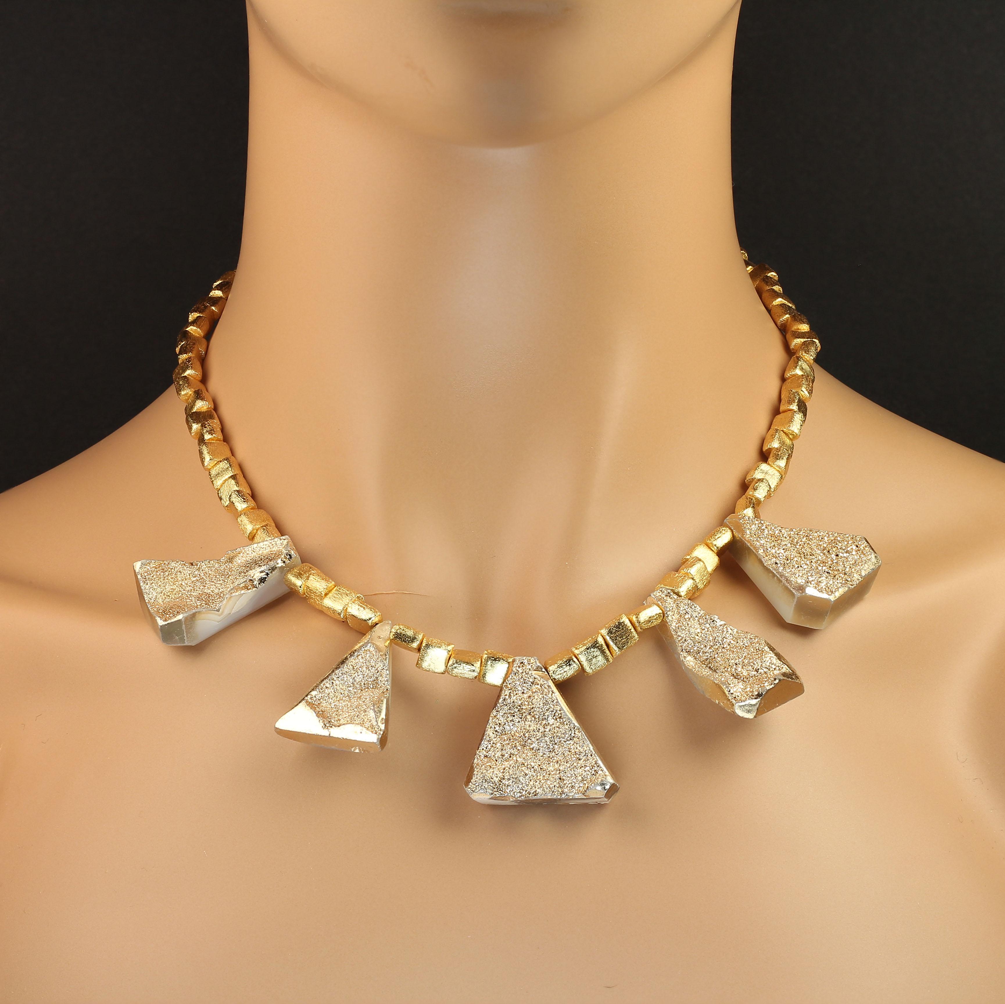 Holiday Sparkles of Five Golden Druzy Triangles dangling from shiny gold tone square beads. Sparkle and Pop your way through the Holiday Season with this Glittering Necklace. This necklace with light up any ensemble, put it on black, put it on red,
