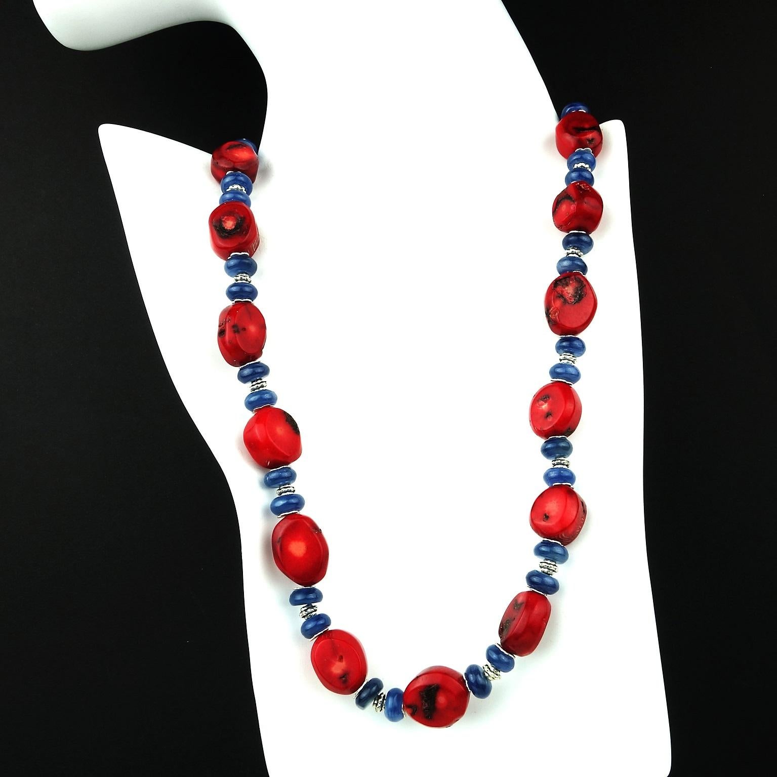 This unique necklace is an updated Southwest look with  Red Coral and Blue Kyanite accented with detailed silvery spacers and a blue demortierite with Sterling Silver hooks clasp.  The deep red bamboo coral is gently faceted and has interesting