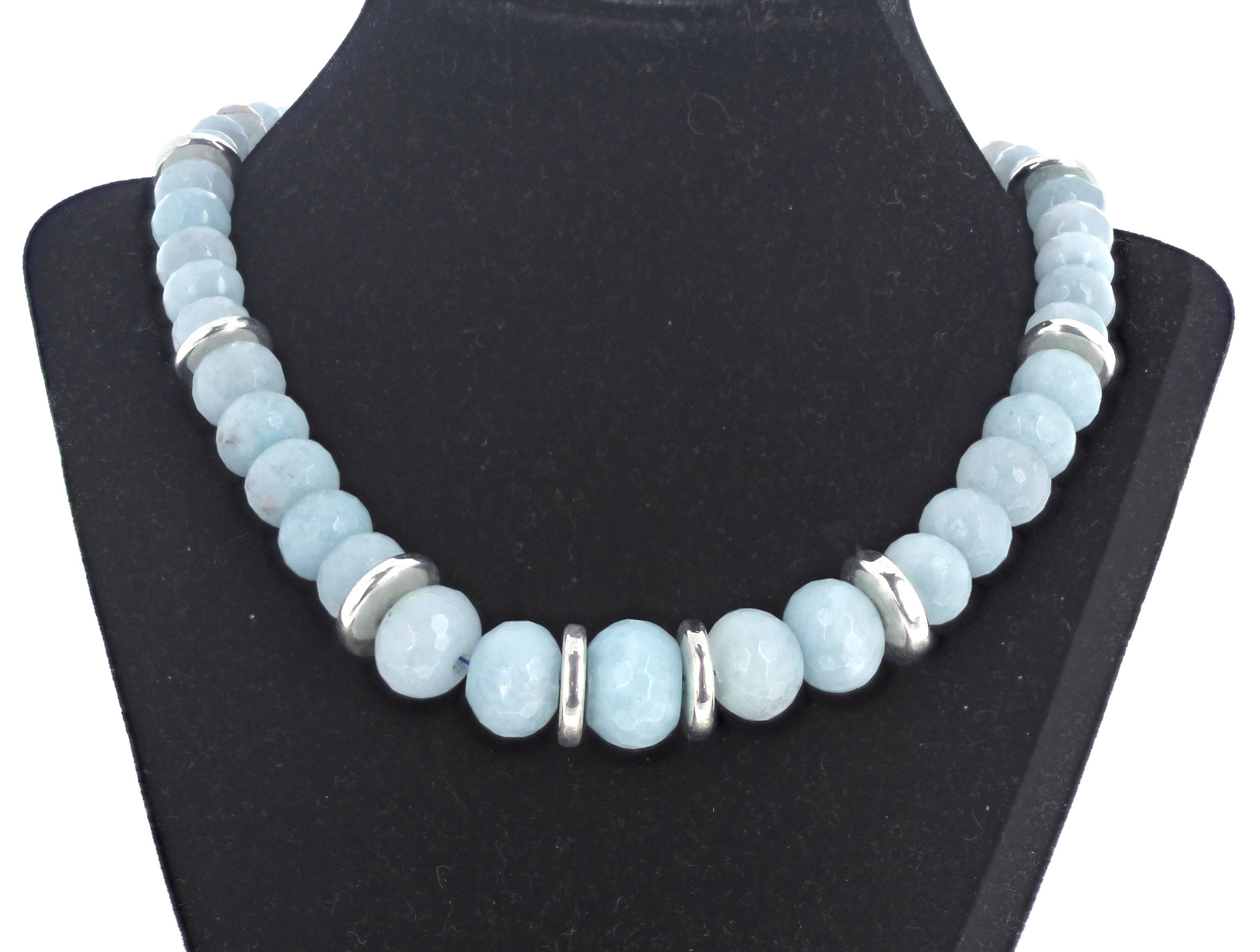 These Aquamarine rocks are beautifully highly polished rondel cut stones.  They are not translucent however the blue color is real and lovely.  They are enhanced with silver rondels.  The largest Aquamarine is approximately 17mm. The clasp is an
