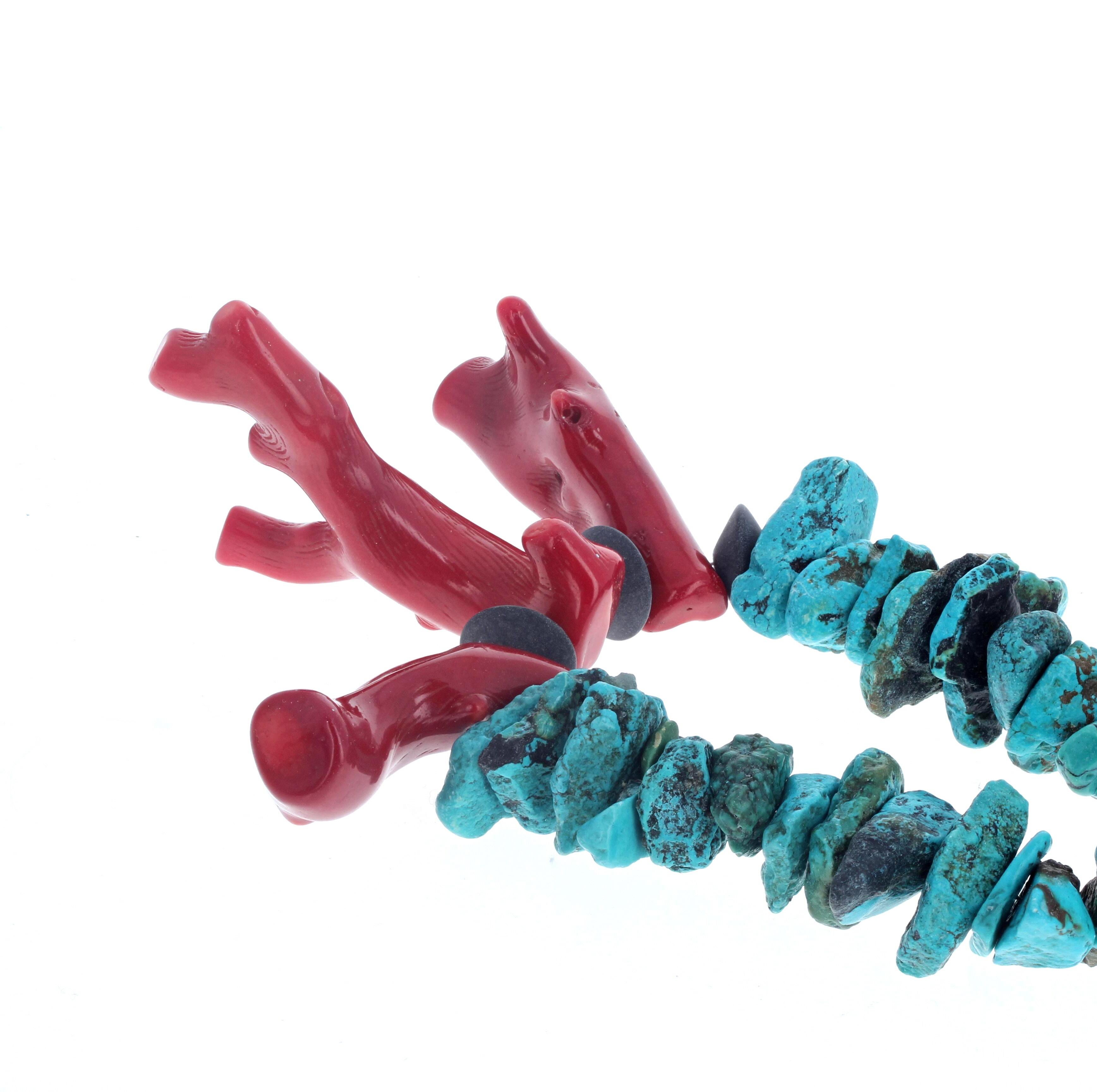 These intensely blue large Turquoise gemstones are set happily with these three highly polished natural dramatic artistic pieces of red Coral - enhanced with rondels of natural Black Onyx - in this 18 1/2 inch long necklace.  The clasp is the easy