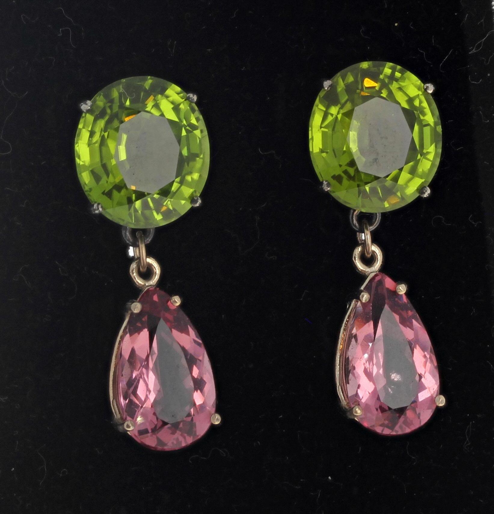 The glittering Green Peridot (set in sterling silver) - 12 1.2mm x 14mm -total 17.46 carats and the Pink Tourmalines (set in 14Kt white gold) -14 1/2mm x 9 1/2mm -  total 7.95 carats. They hang 34 1/2mm long.  