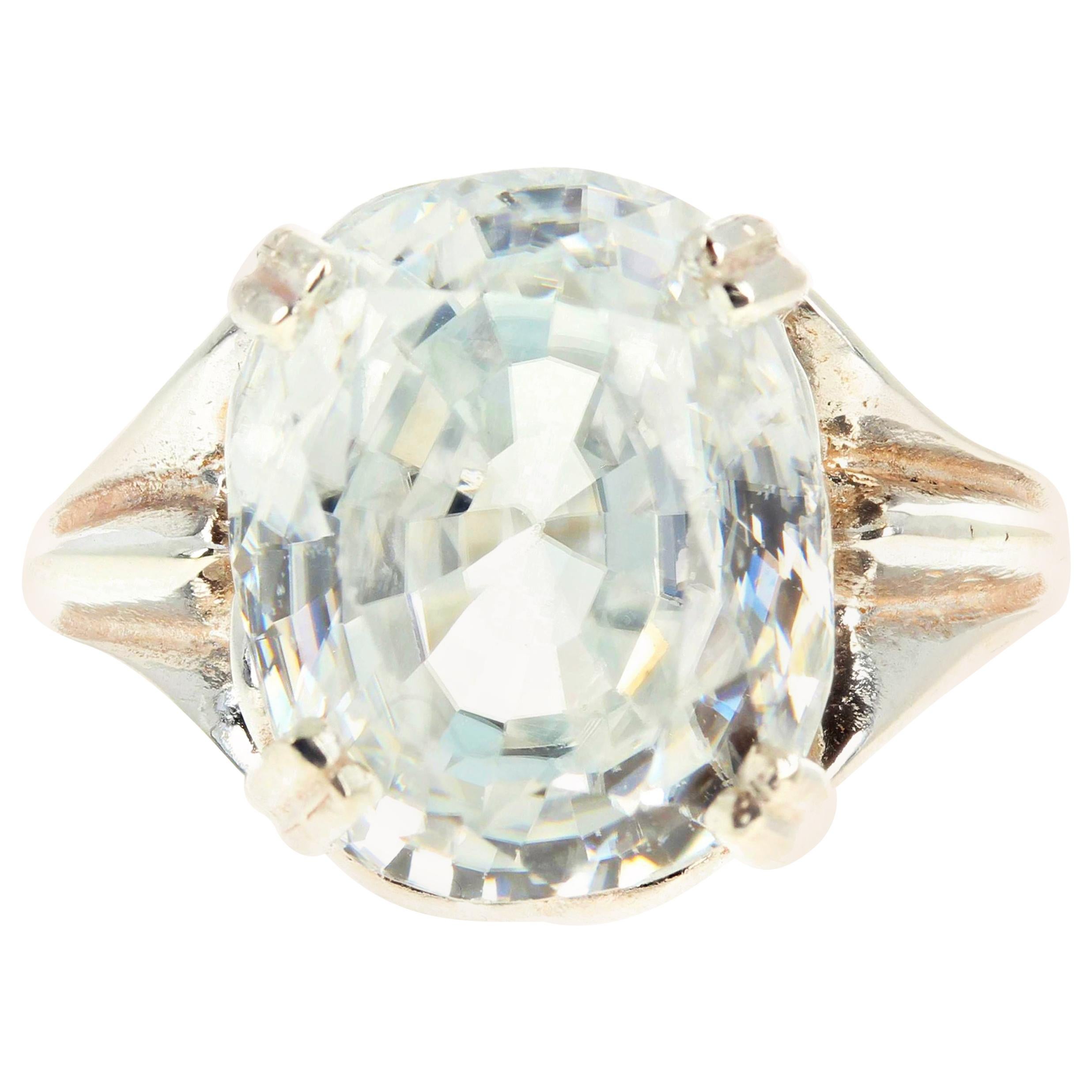 This gorgeous 14.6 mm x 12 mm glittering white natural Cambodian Zircon looks like a huge diamond on your hand !!  These 15.69 carats sit up brilliantly on this sterling silver ring size 7 (sizable).  There are no eye visible inclusions in this