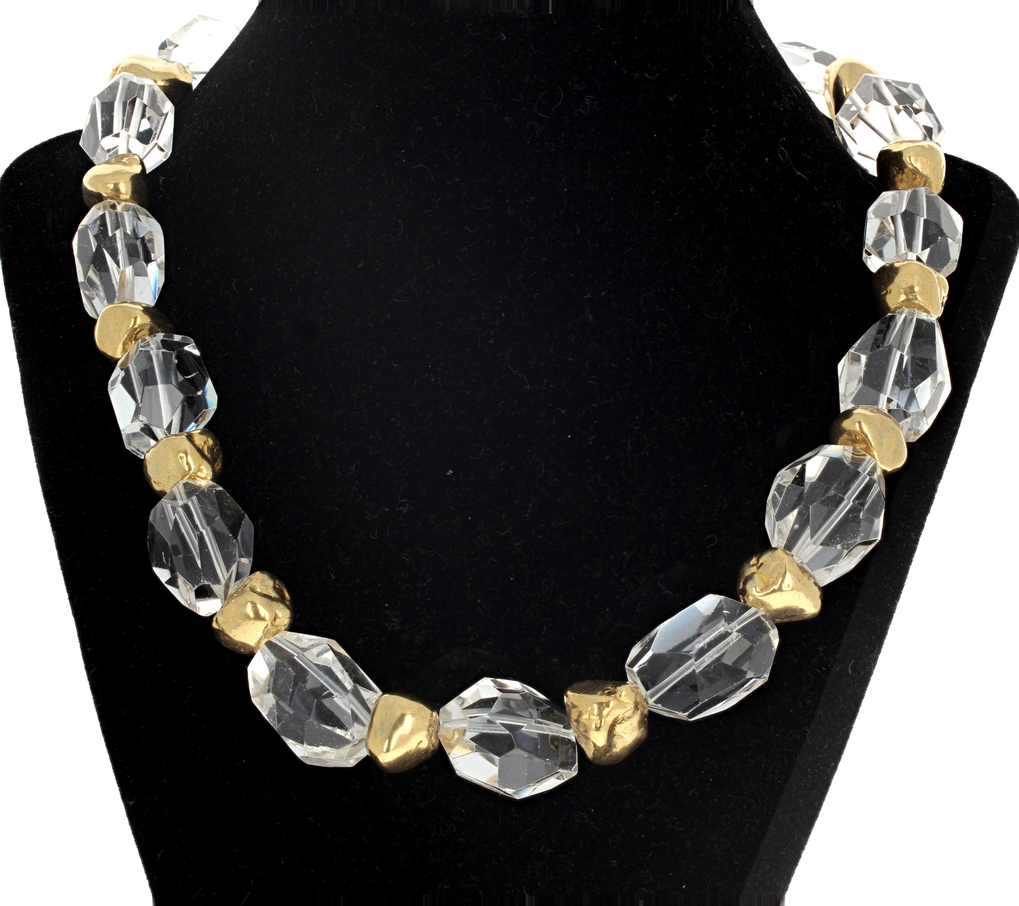 Glitteringly brilliant natural translucent real white Quartz (approximately 24mm x 18mm) enhanced by these highly polished real gold plated chunks is 19 inches long.  The gold plated clasp is an easy to use hook clasp.  This goes 