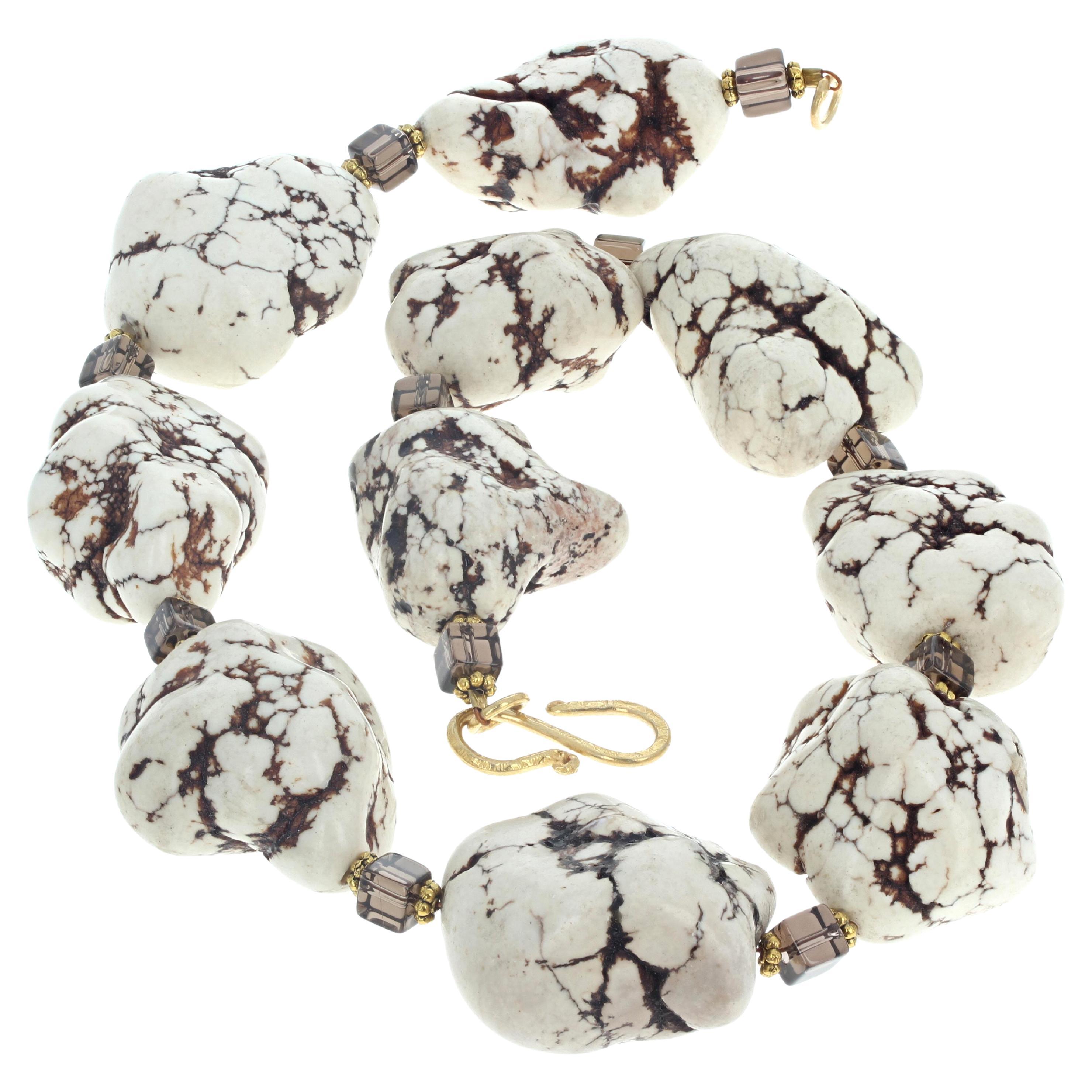 Known as Howlite Crystal Beads - Creamy White Brown Vein Beads - these are polished so they sit comfortably and artistically around your neck in this 19 inch long necklace enhanced with large gem cut rectangles of natural Smoky Quartz.  The largest