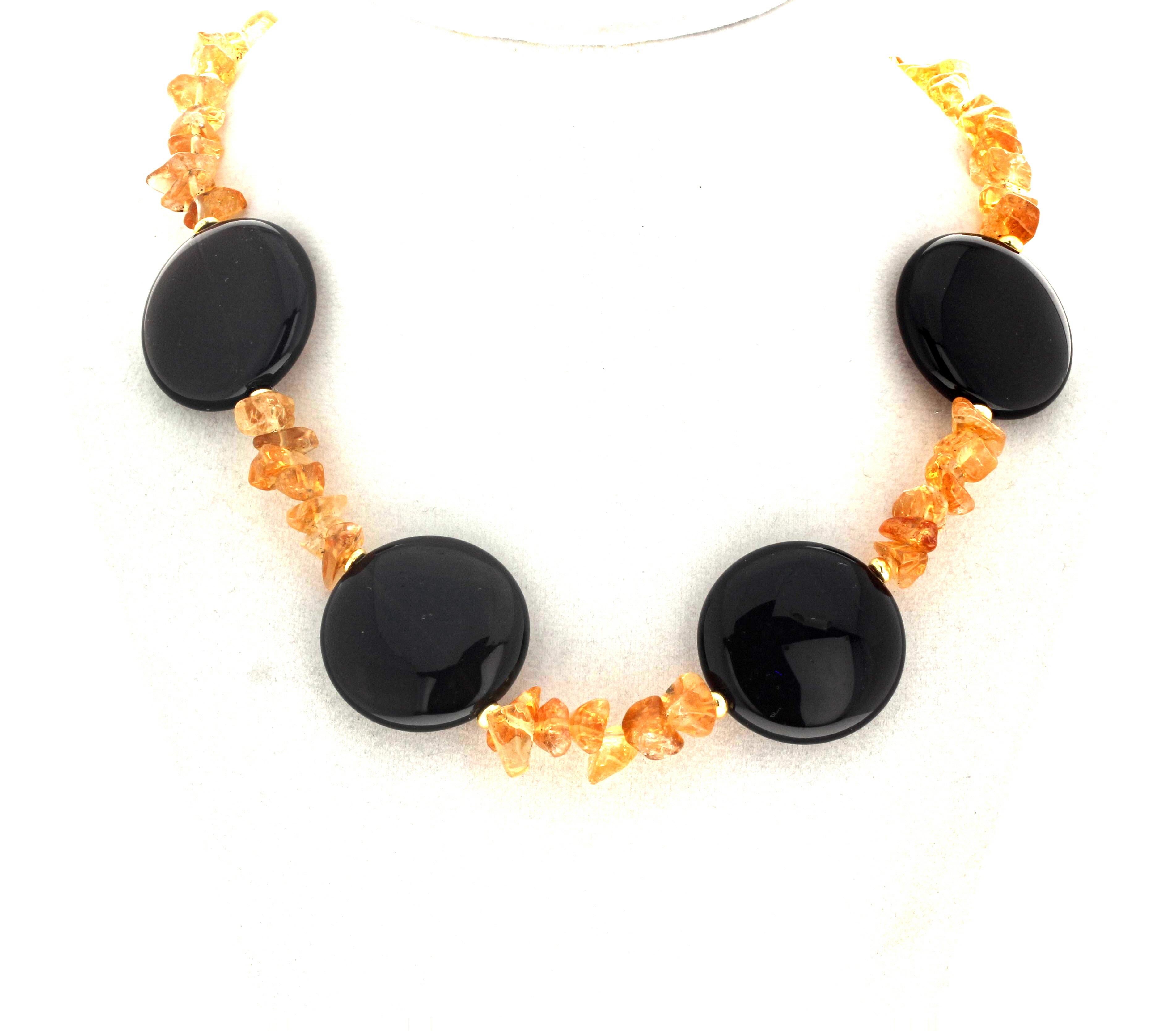 These slightly dramatic outstanding polished natural goldy yellow Citrine chips show off these highly polished natural round dark brown Citrines in this 17 3/4 inch long necklace.  The largest Citrine chips are approximately 10mm and the beautiful