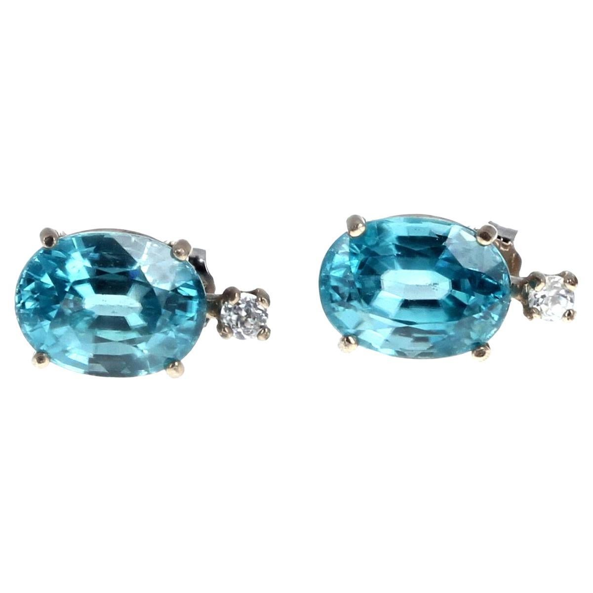 These very rare brilliant natural blue Cambodian Zircons are each 5 Carats (10mm x 8mm) and are enhanced by teeny tiny little white Diamonds set in the easy to use sterling silver stud earrings.  There are absolutely no eye visible inclusions in