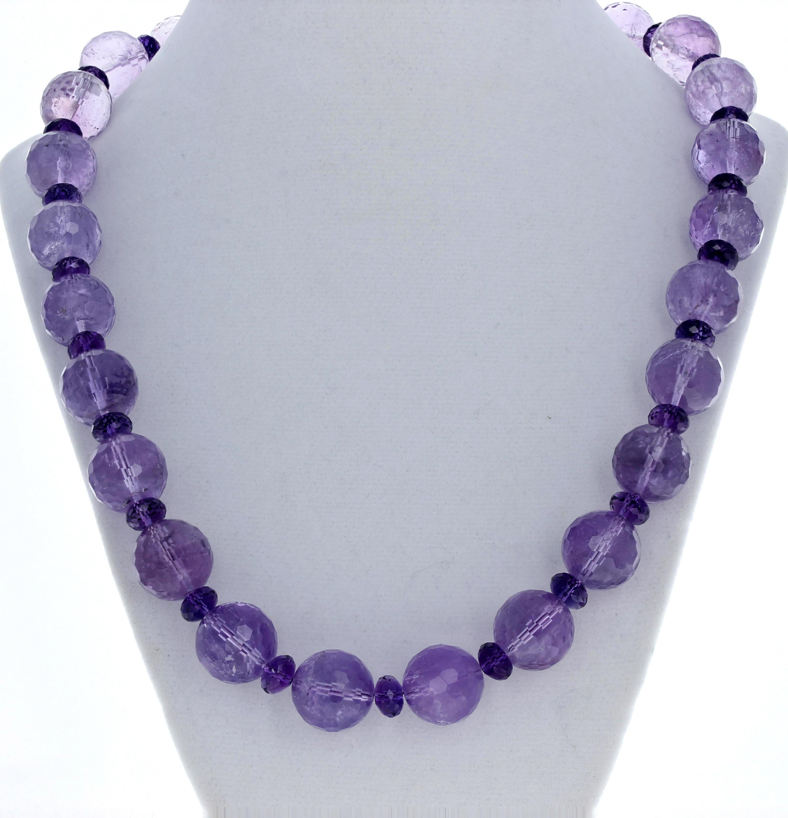 These highly polished sparkling natural real Amethyst gems are enhanced with intensely colored Amethyst gems as spacers.  The large gemstones are approximately 16 mm and the beautiful spacer Amethysts are approximately 8 1/2mm.  The spacer gemstones
